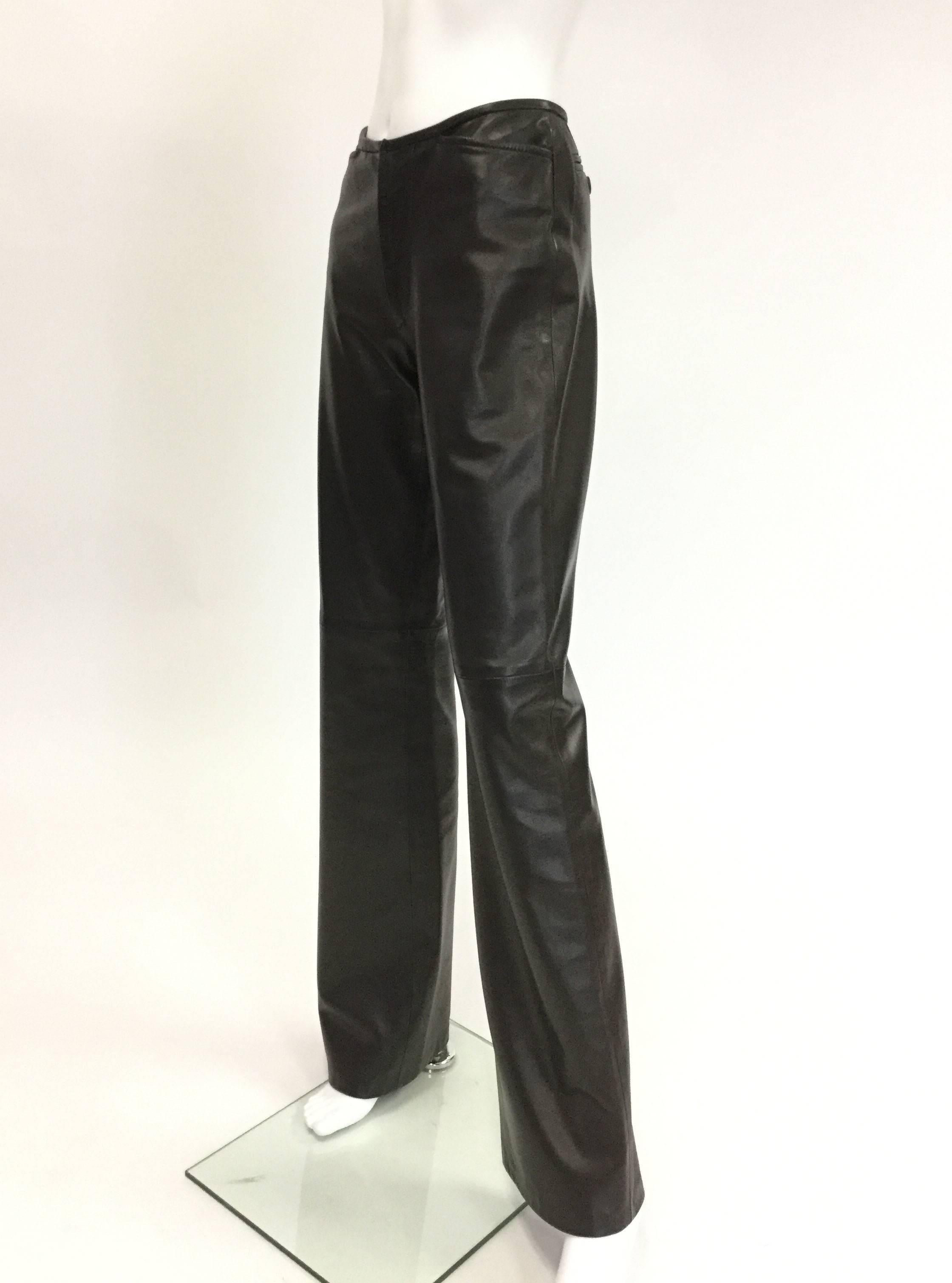 
These gorgeous leather trousers by Gucci are so sexy and fit like a dream! The espresso brown leather hugs the wearer's hips, stays fitted down the thigh, and finally flares delicately outward at the knees. They are incredibly soft -- 