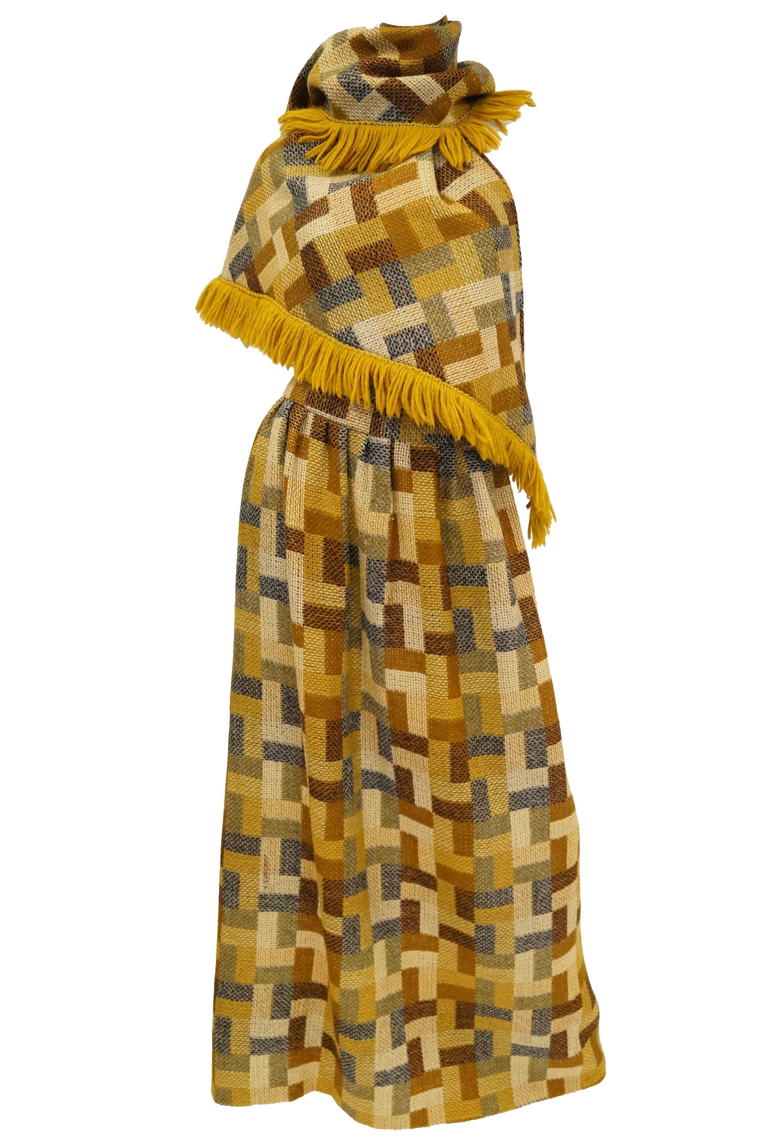 Beautiful woven skirt and matching shawl in amber tones! This ensemble features a maxi a - line skirt with wide waist band, as well as a triangular gold - fringed shawl. The fabric is loosely woven wool and is soft to the touch. Skirt is beautifully