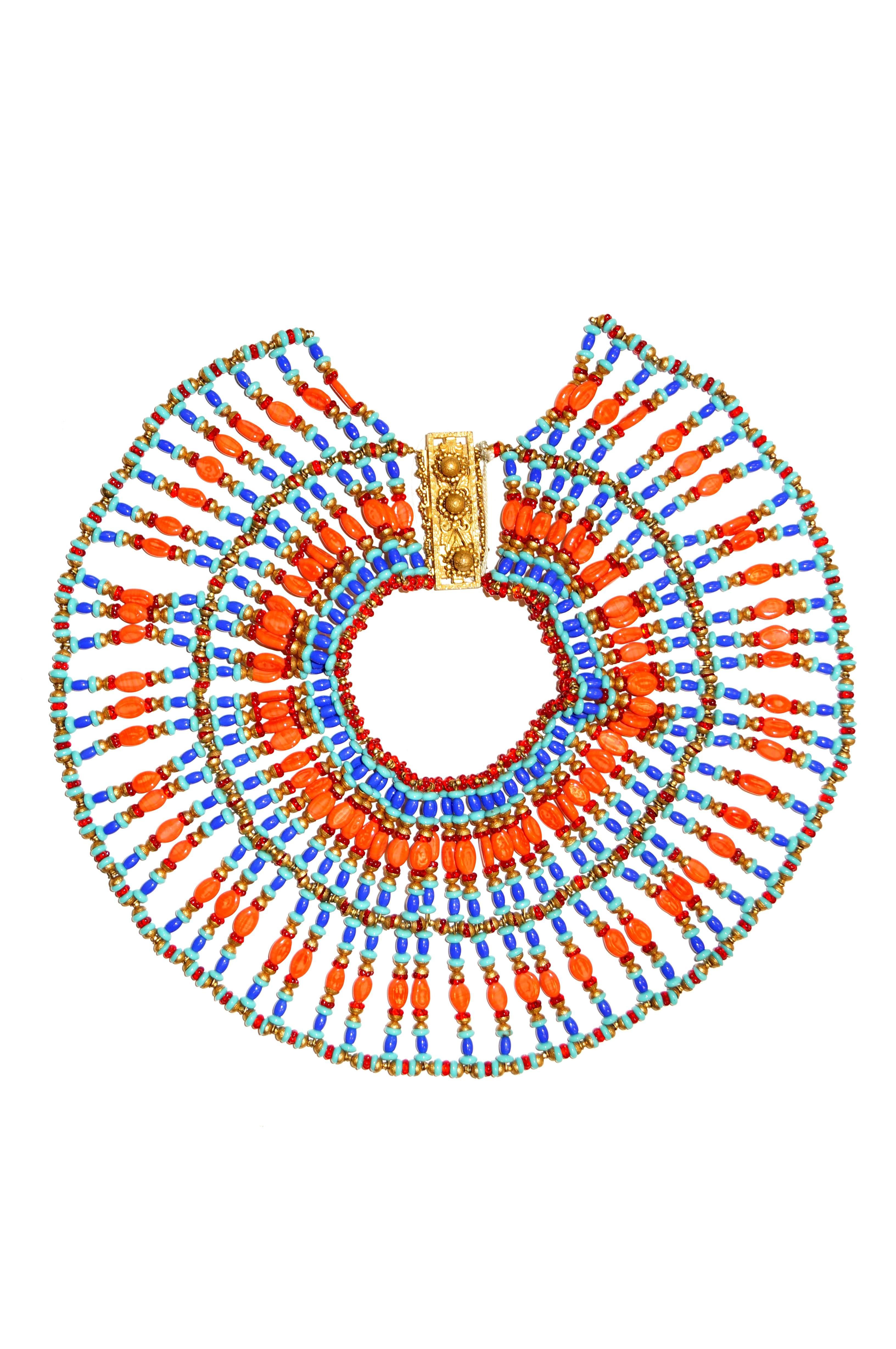 NWT Beautiful Egyptian revival bib / collar choker necklace by Larry Vrba for Miriam Haskell. The necklace is composed of 57 strands of beads -with 29 beads making up a single strand of the necklace- held together in a circular collar. The necklace