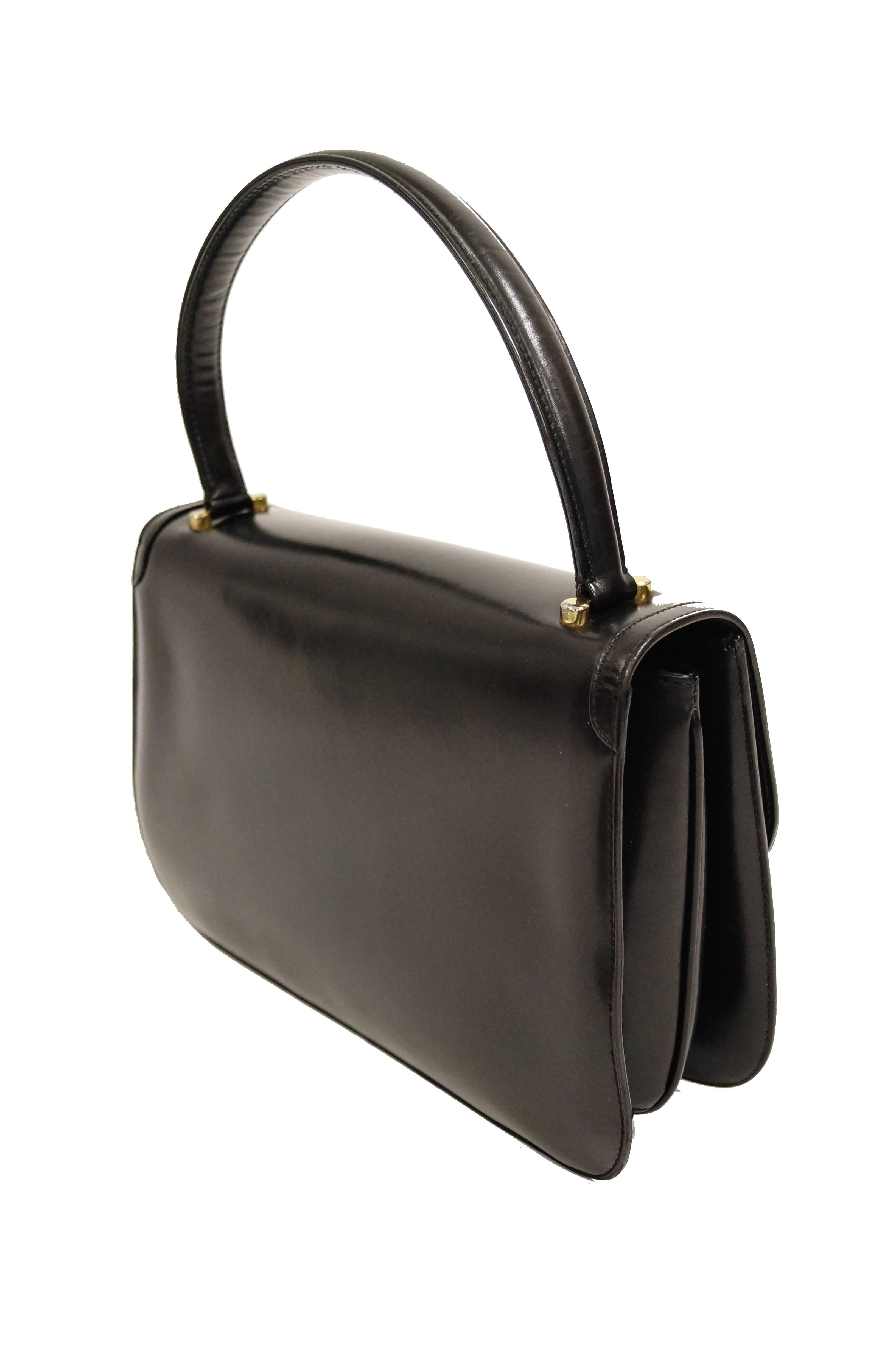 1960s Gucci Black Leather Top Handle Handbag with Crescent Lock  1