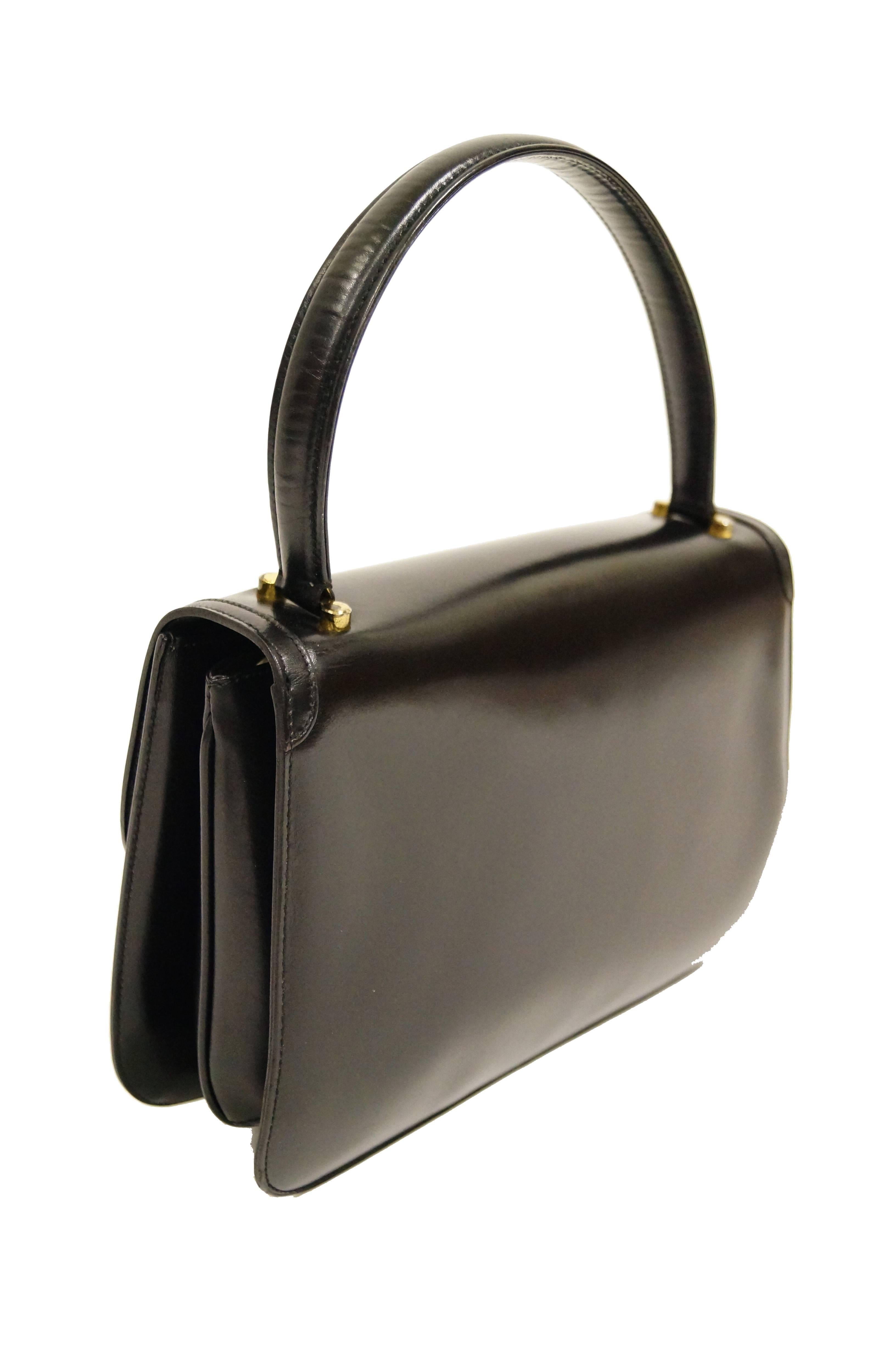 1960s Gucci Black Leather Top Handle Handbag with Crescent Lock  In Excellent Condition In Houston, TX