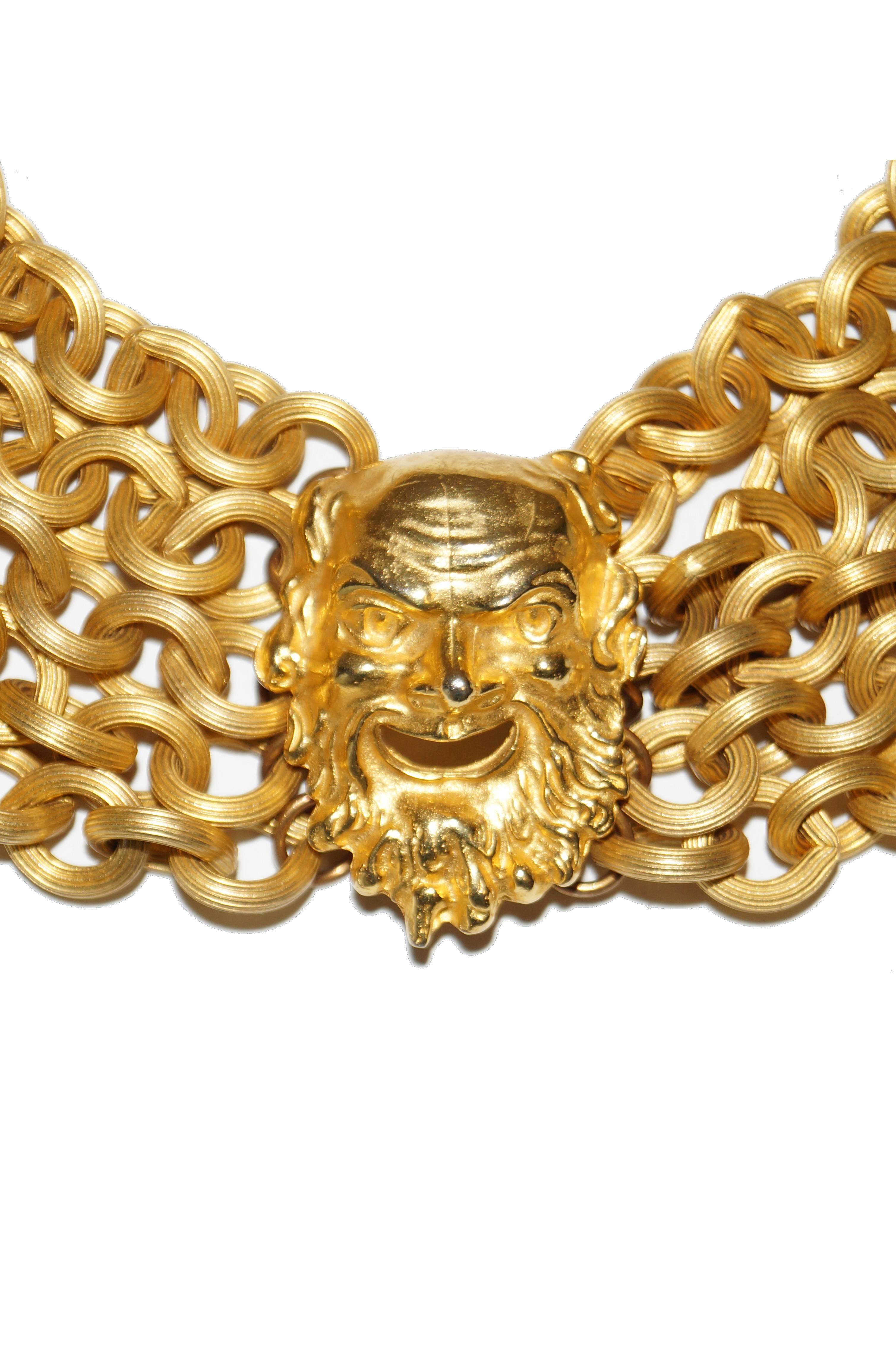 Heavy and well made choker by Catherine Prevost of London, composed of a gold - tone sculpted Zeus head suspended between five heavy etched circle - chains. Striking statement choker you simply can't ignore! Reminiscent in mythological theme and
