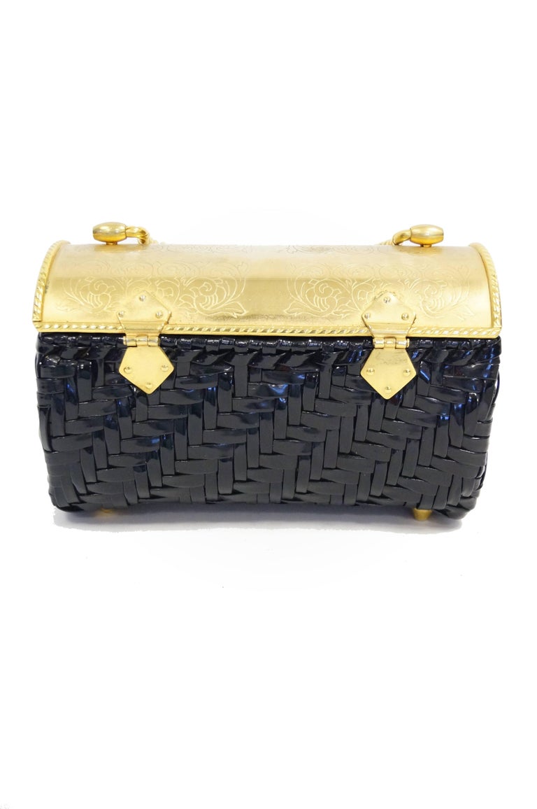 Lot - Neiman Marcus brown woven satin box purse with gold tone clasp,  cording strap, with branded metal tag inside.