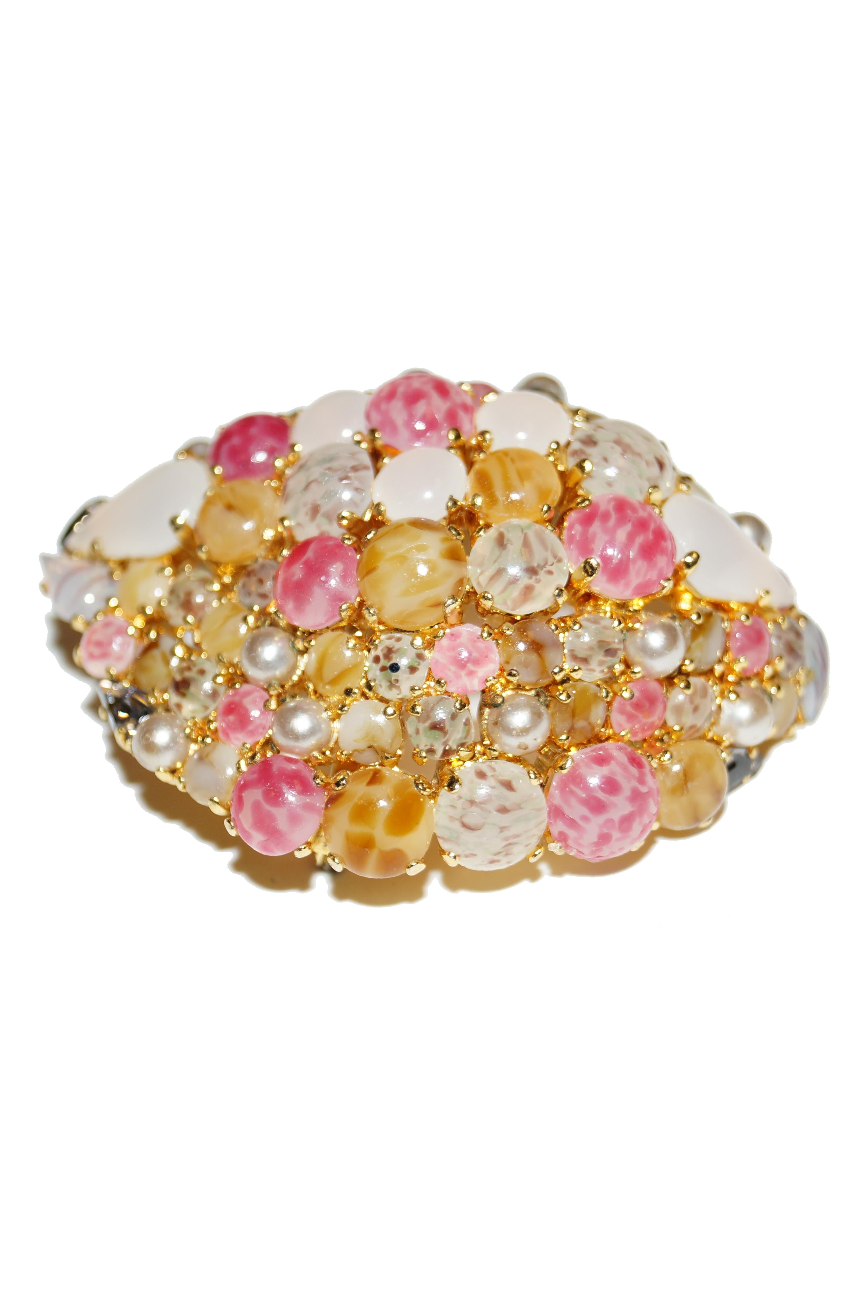 Beautiful, organic arrangement of various circular and tear- drop shaped glass and pearl cabochons in a romantic palette of pinks, golds, and champagne silvers. The brooch is semi - spherical, giving it the appearance of a dazzling pile of jewels!