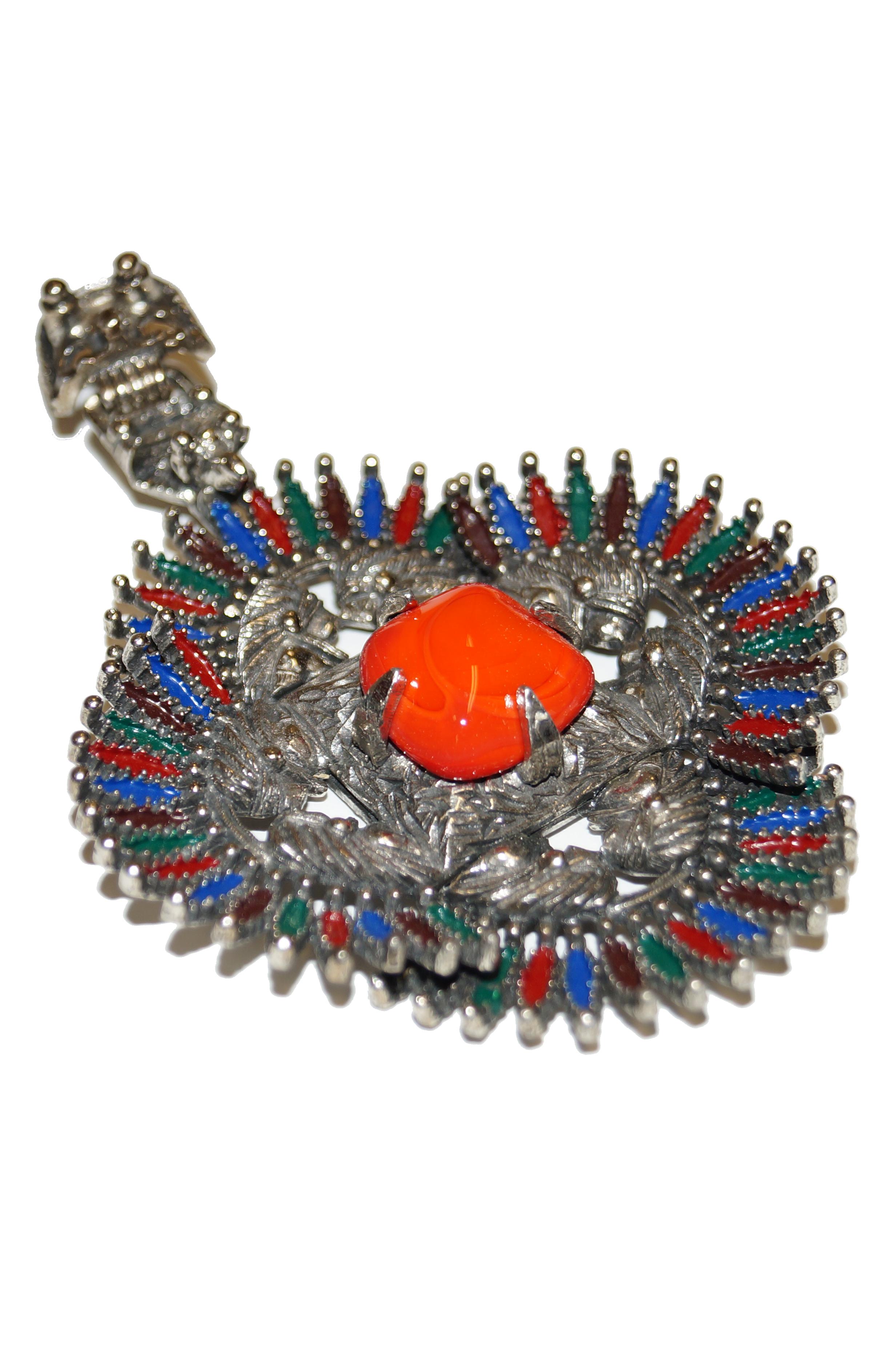 Amazing Mayan  - inspired medallion by Larry Vrba for Castlecliff! This pendant features a brilliant red-orange cabochon center, flanked on all four sides by inward- facing chieftains. The figures are enclosed by long, marquise - cut stones in red,