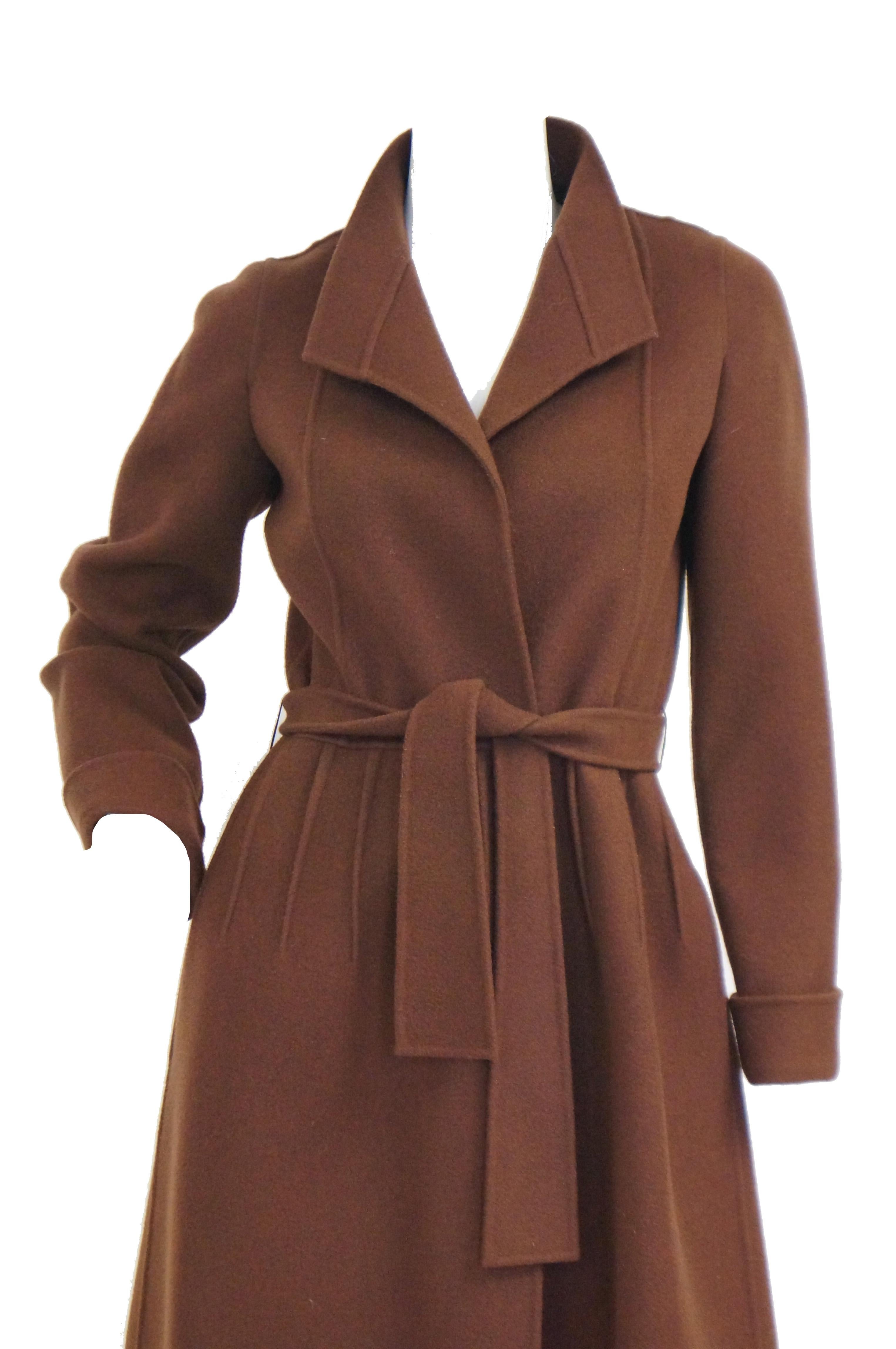 Andre Laug created a line of clothing inspired by Audrey Hepburn in the 70s. This brown wool coat  is simple and elegant just like her! Includes a belt and pockets. Made in Italy.
Itlay- 36
US 0-2 or XS
