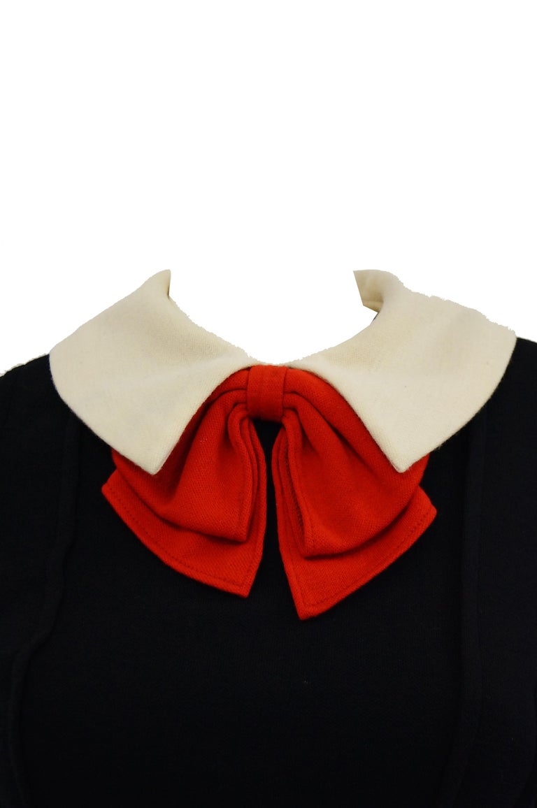 This same ensemble is found in a number of museum collections including the FIDM archive (of which a photograph is included). Striking 1960s Rudi Gernreich for Harmon Knitwear dress and sweater set. The playful ensemble consists of a solid black