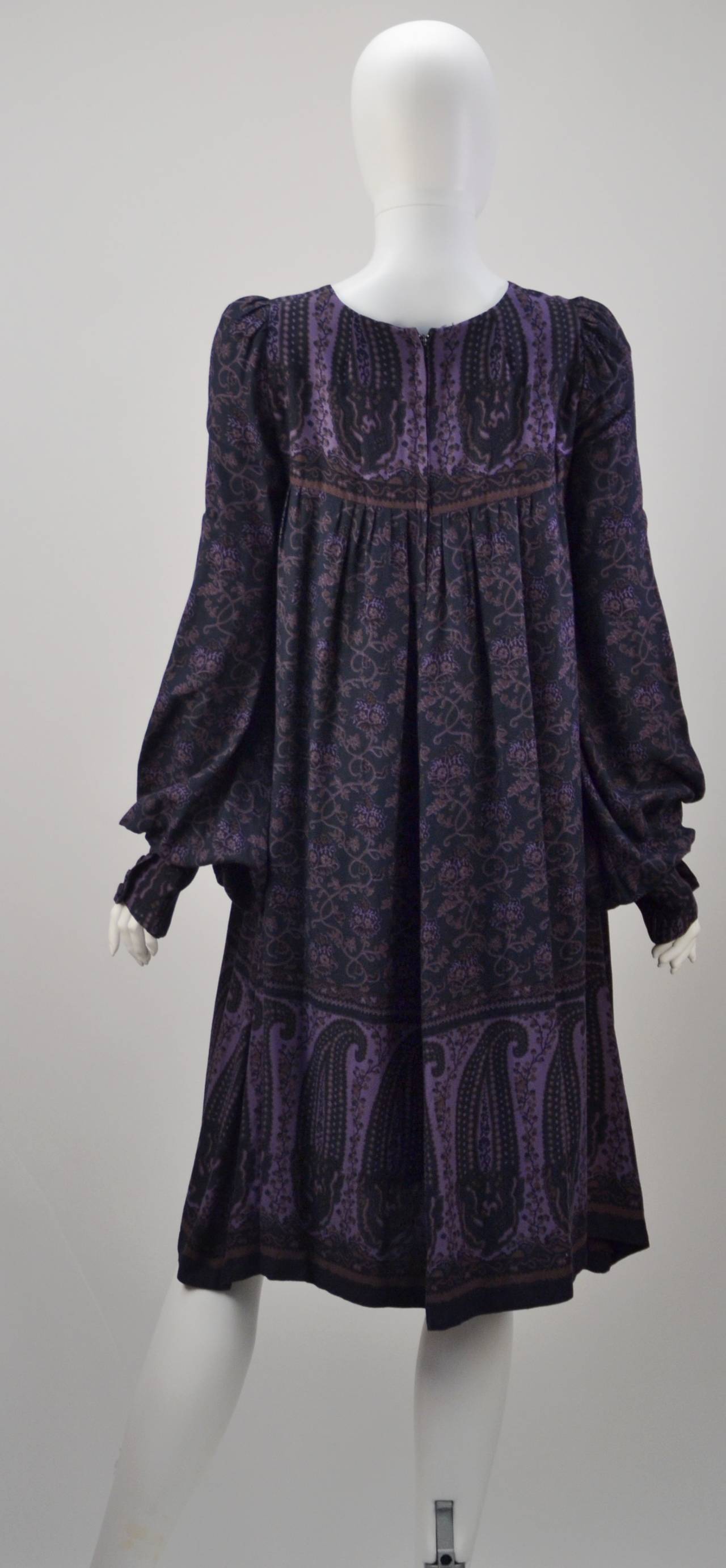 Own a piece of fashion history -- a wearable one! Classic vintage Biba smock dress with exaggerated sleeves that button at the cuff. Using typical colors loved by Barara Hulanicki's aunt Sophia, this absolute classic piece of fashion history boasts