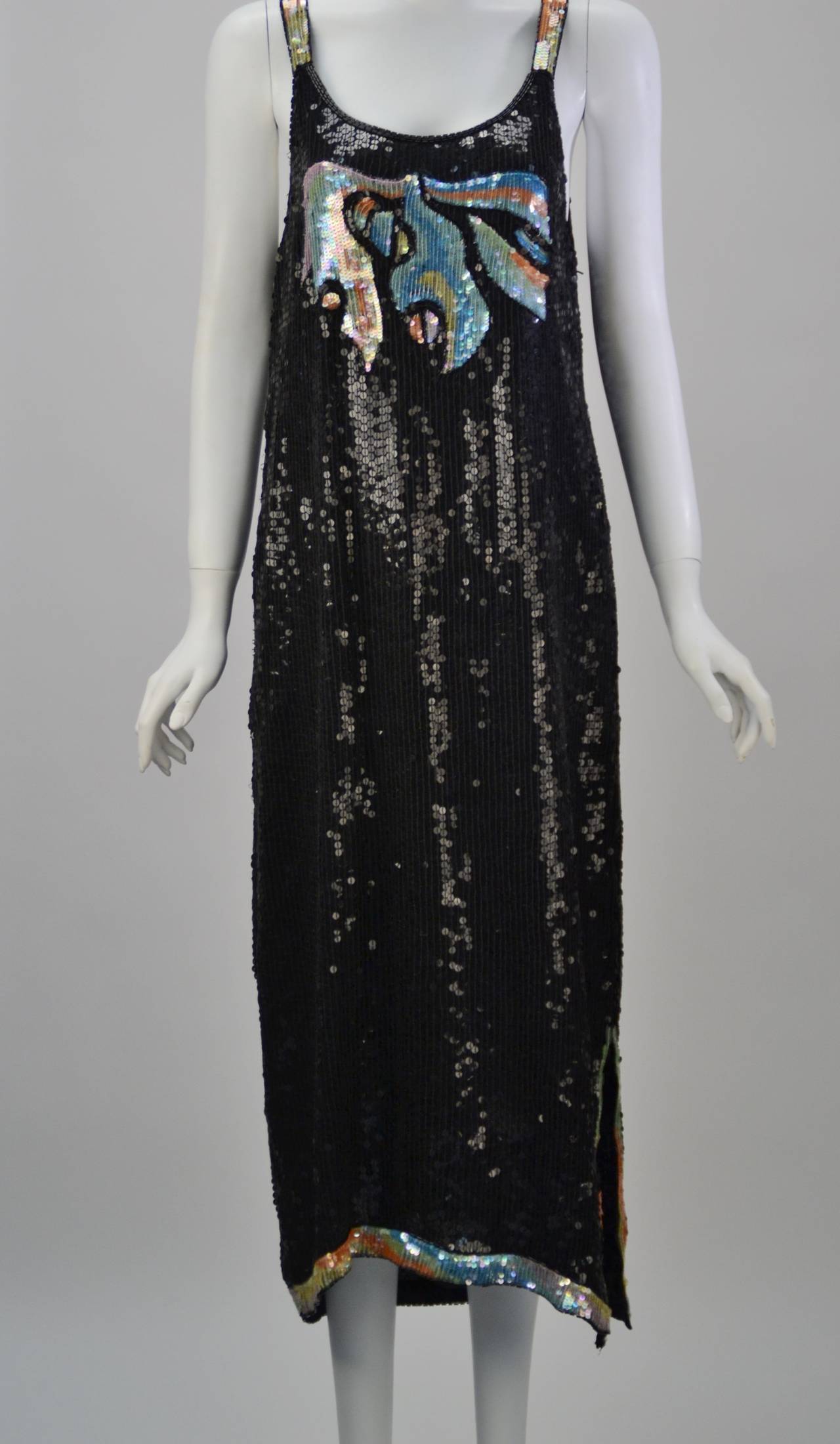 1980's Stunning sleeveless silk black with contrasting multi-color sequin and beaded dress from the prestigious Isabell Gerhart boutique in Houston (now closed).  It takes on a 1920's flapper silhouette and includes an 11.5