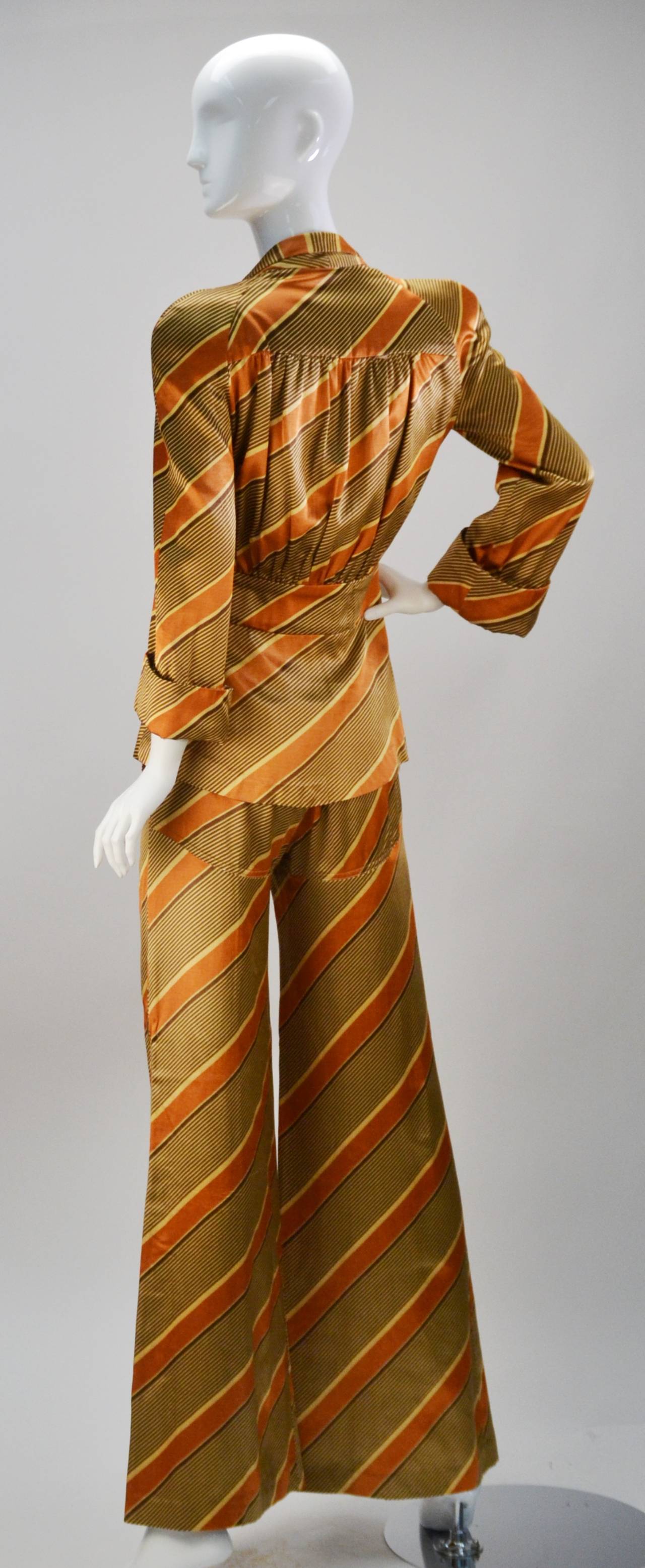 This ensemble is classic 70's Biba -- both defining and reflecting London and the much of the World's culture of the time!!!!  Using typical Hulanicki colors this wearable collector's piece is made from silk satin and boasts stripes in both the 