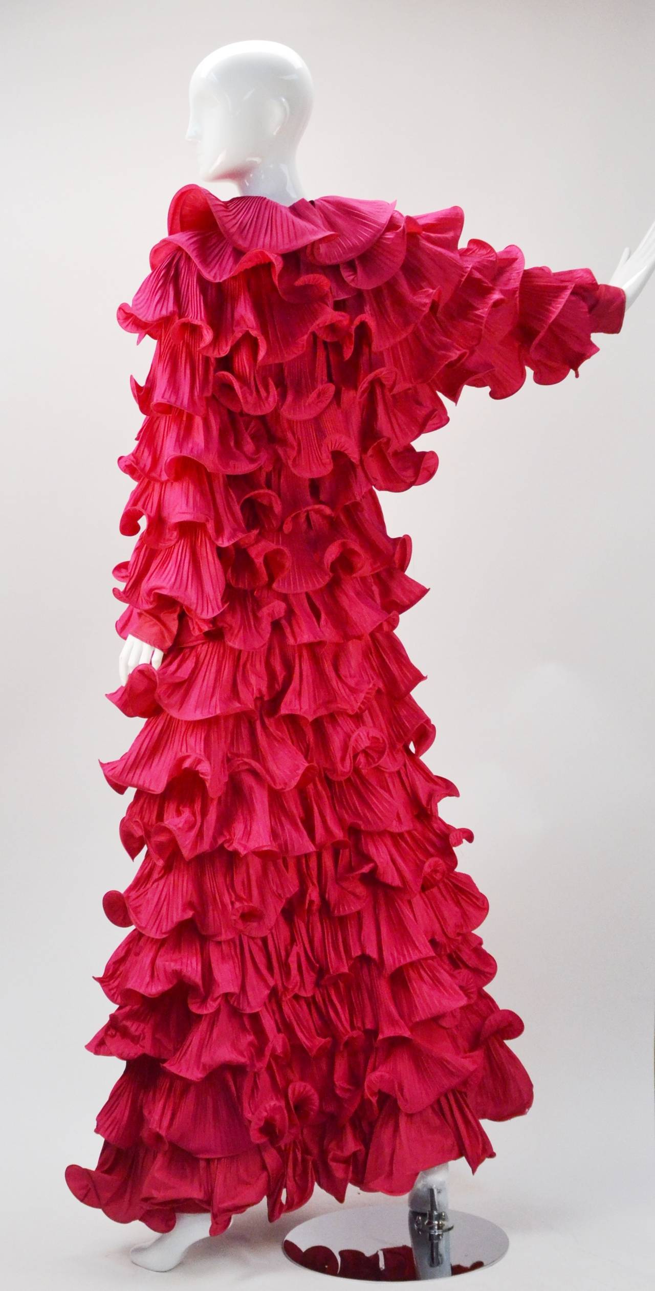 Beyond fantastic..... is this RARE Pierre Cardin fuchsia ruffled silk taffeta long sleeve gown.  Runway piece designed in the early 1980's and was the show stopper in the Ebony Fashion Fair.  Since its unveiling the gown has lived amongst the gowns
