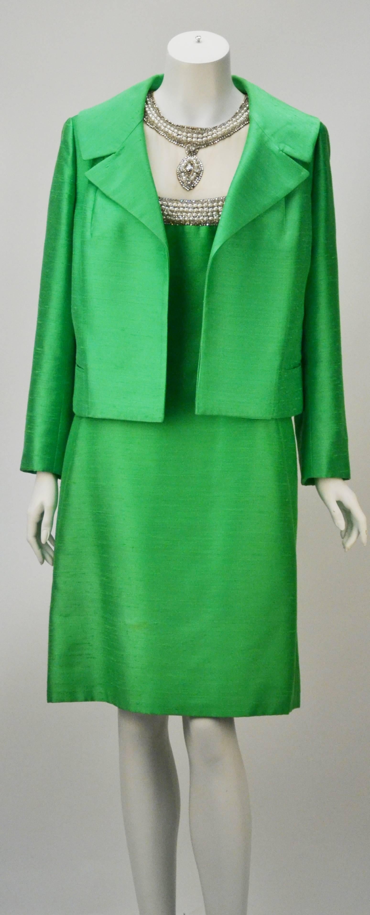 Iconic 1960's Mr. Blackwell Custom silk green 2 piece dress and jacket evening ensemble.  Jackie O' might have had this dress.  If she didn't and saw it, she would definitely consider purchasing it.  It is perfection of color of fit and of