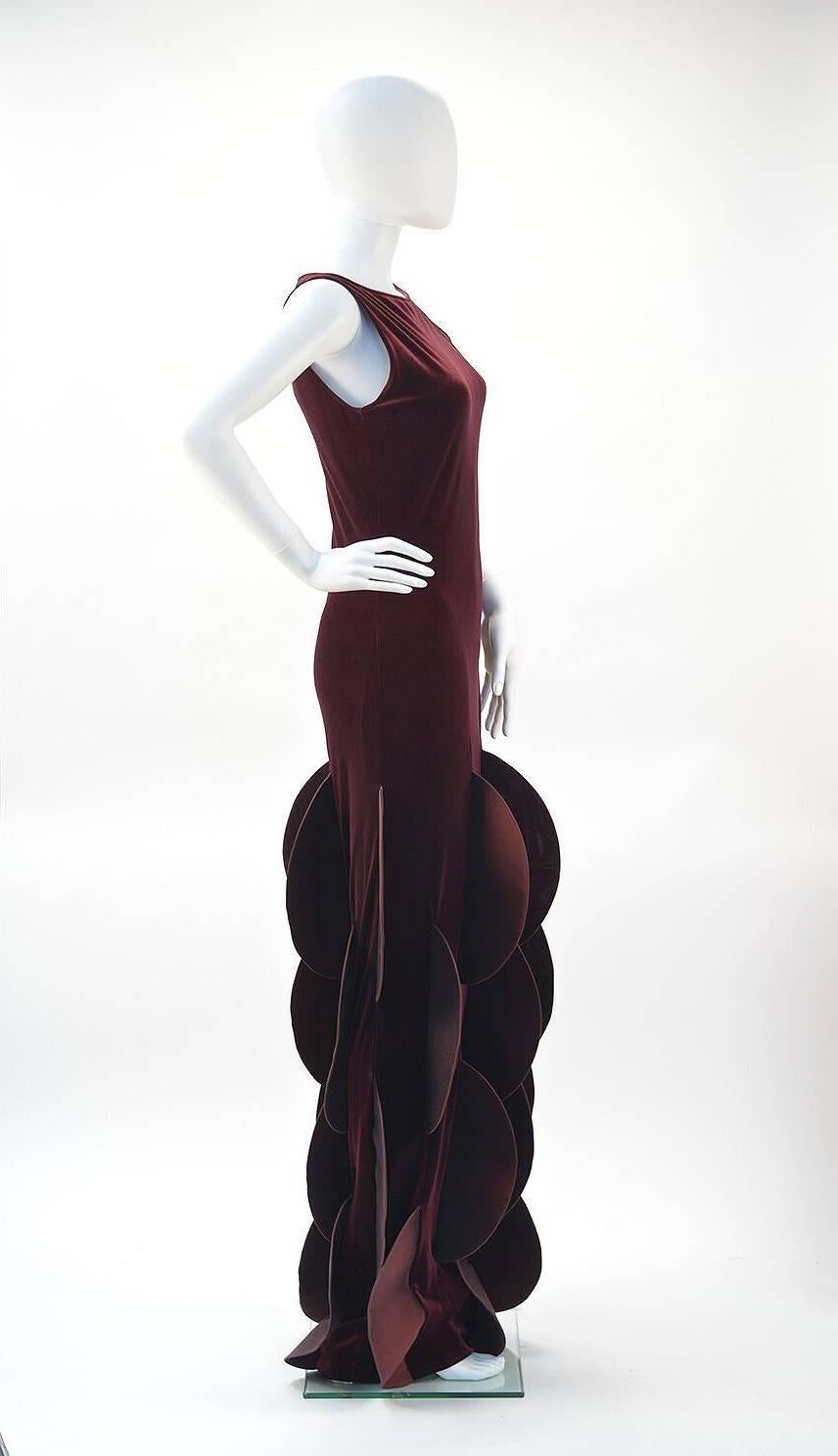 This "Evolution de Pierre Cardin" dress was created after the fall of the Berlin wall and Cardin employed experts from formerly communist countries to produce his garments... as part of his own evolution and the world's, as