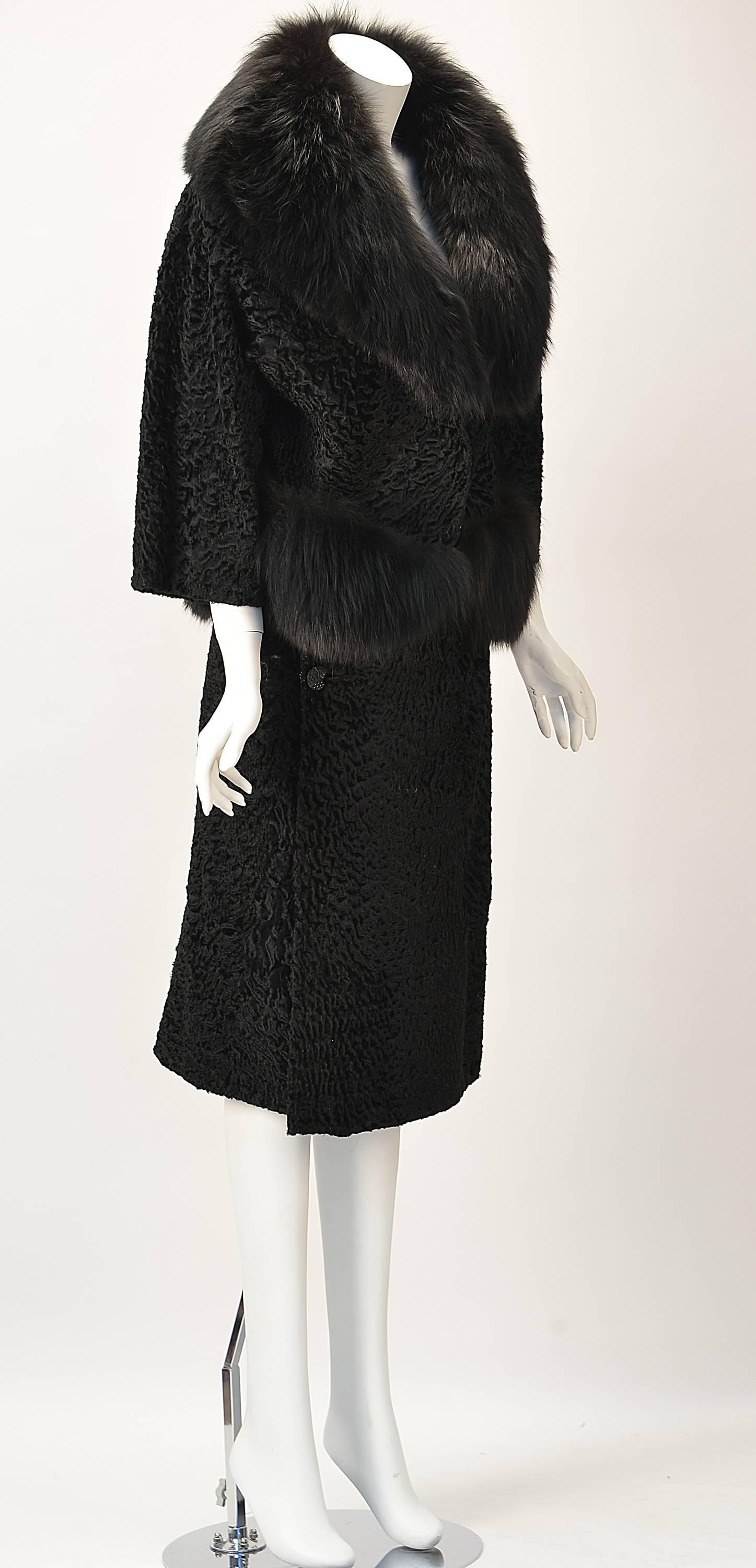 Absolutely Divine!

Martha Weathered Imported fabrics and owned a boutique in Chicago. This is one of her ensembles she had designed and made of beautiful black Persian lamb with large mink fur trim. The jacket has three quarter length sleeves and
