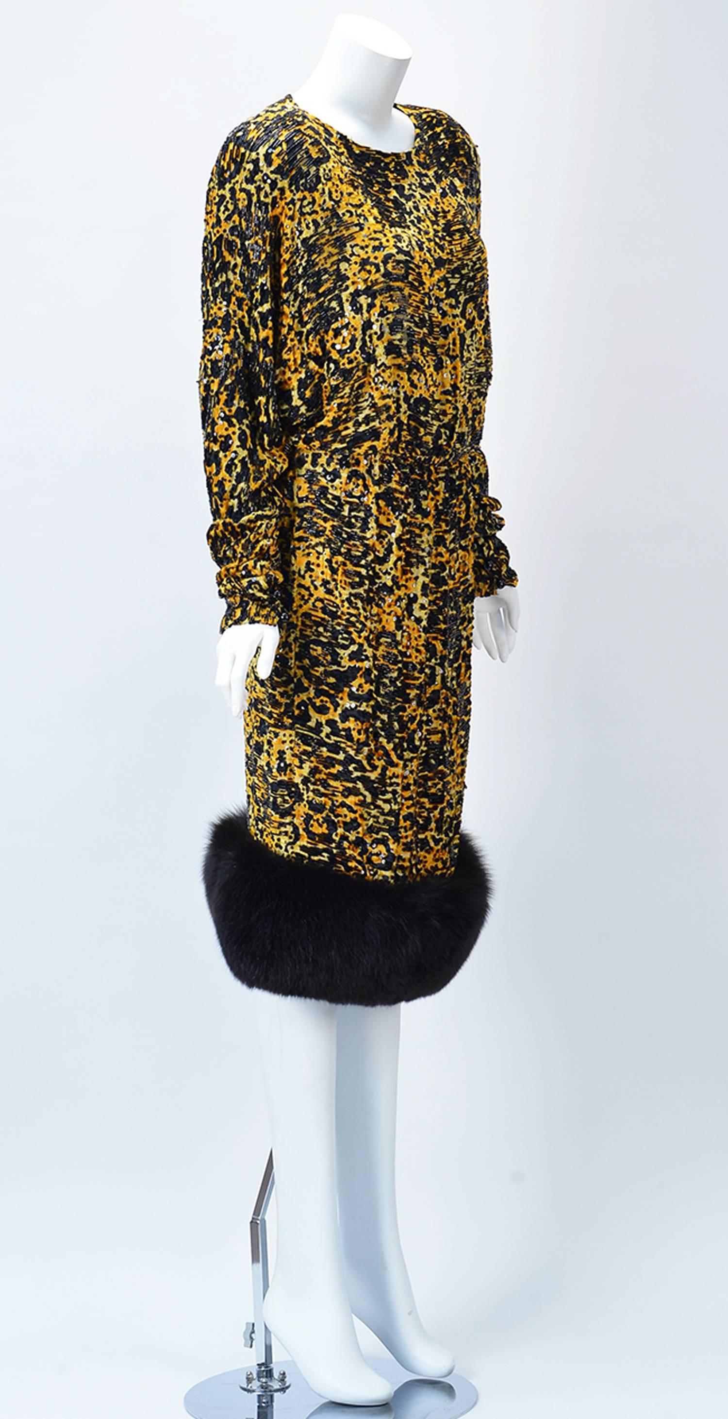Bodacious 1980's yellow and black leopard silk burn out or Devore dress with Mink  hem by Bill Blass for Neiman Marcus. Thoughtfully embellished with black sequins and beading. Batwing type sleeves button at cuff. Five large black round buttons at