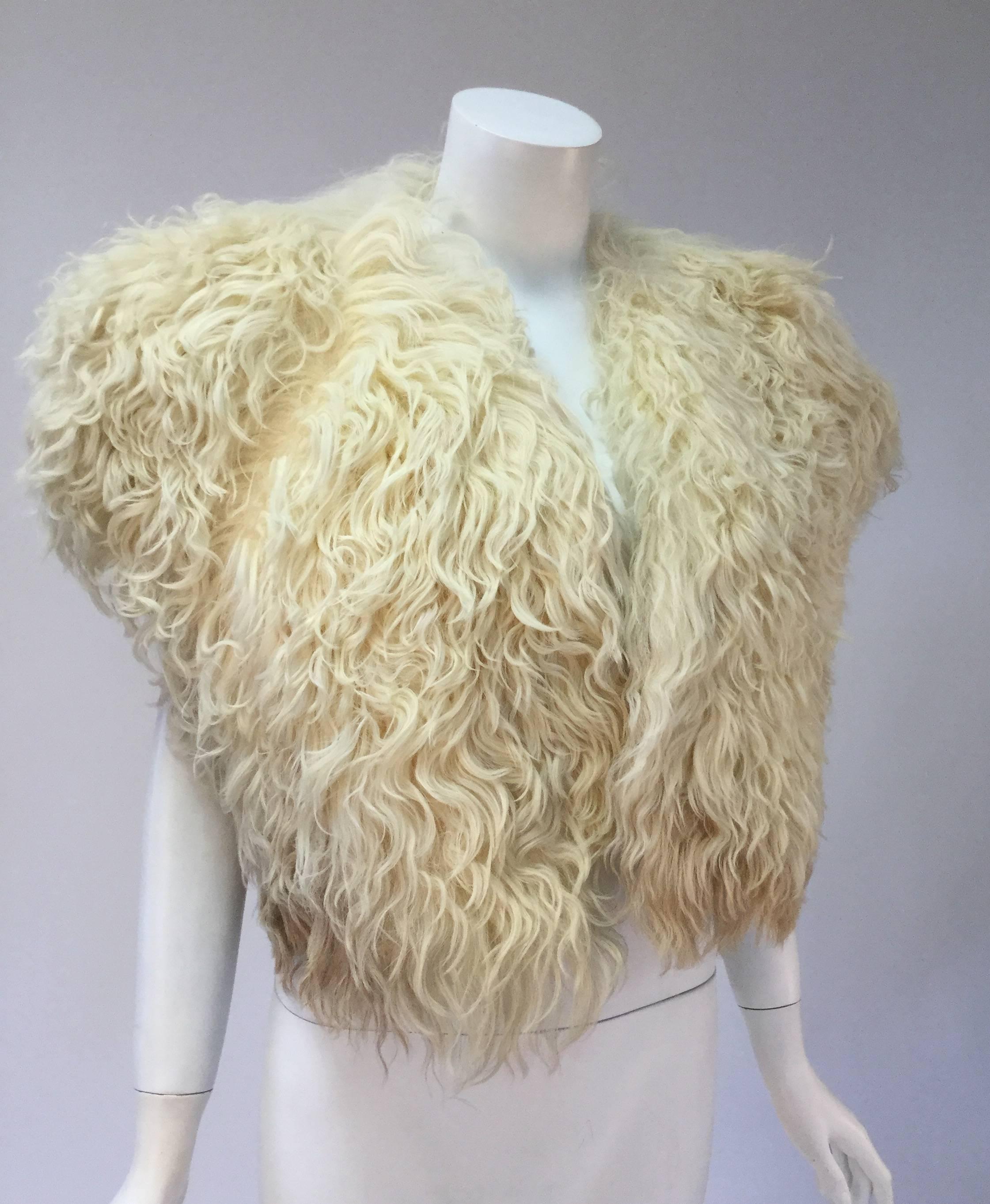 Fantastic Courreges Paris cream karakul bolero.  Alluring ombre long fur from white to light brown, cropped, sleeveless, open front, L 18