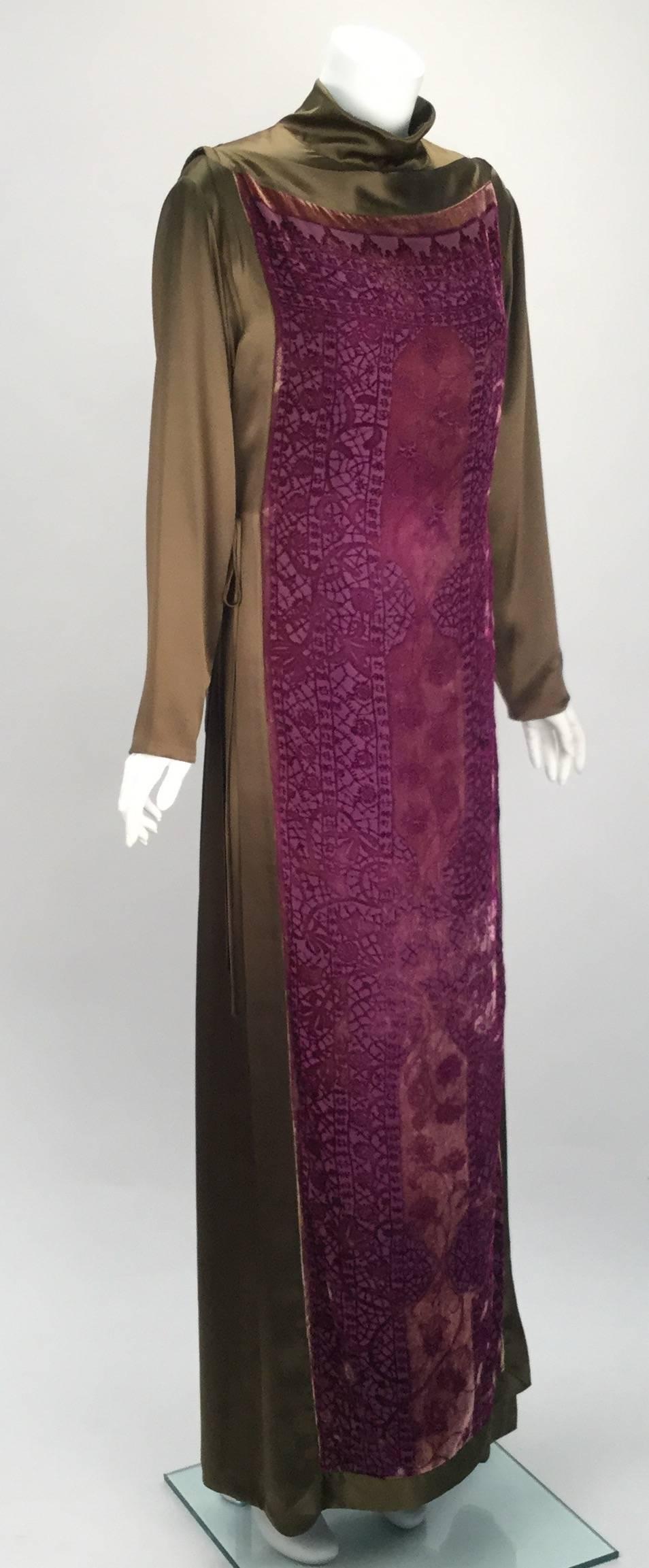 Created by one of our favorite designers most known as the Queen of digitally printed fashion,  Sylvia Heisel, is this unbelievable early olive green silk caftan creation with purple burnout cape. The ensemble is versatile and beautiful in every