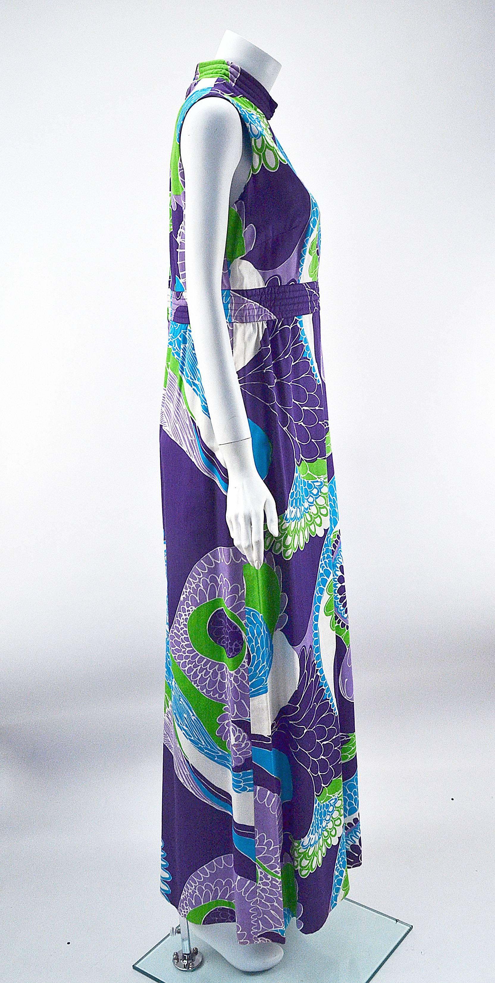 A 1970's classic!!!!   

Early Tori Richard multicolor, vibrant Hawaiian print sleeveless cotton maxi dress. Known for vibrant Hawaiian prints and wearable design, the dress is perfect resort wear for spring or anywhere wear for summer.  Comfy and