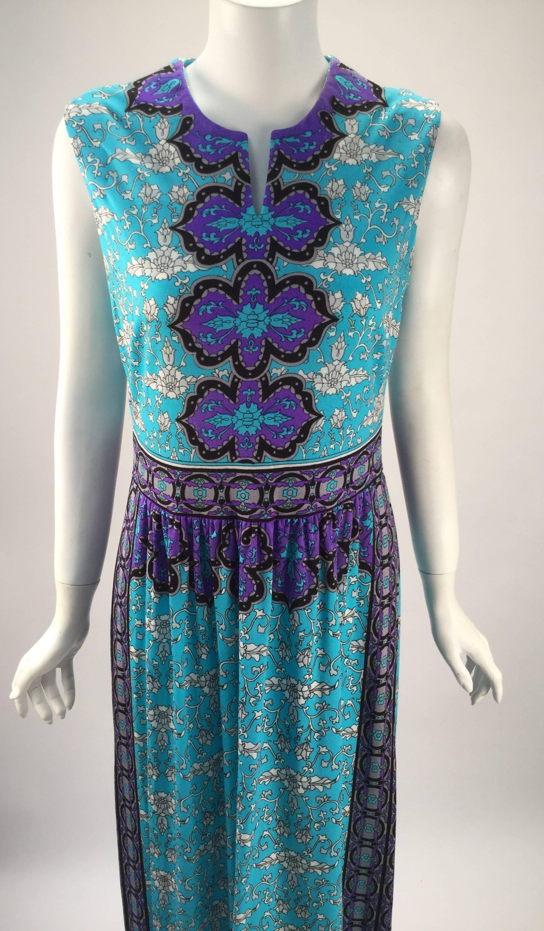 Wonderful Mr. Dino dress, perfect for summer!  Dress is bright blue with a purple, blue, white and black print all over the dress. Small v-neck. Zipper center back. Hook and eye closure.

Modern US size 6

Hem can be lengthened 2 inches

*All