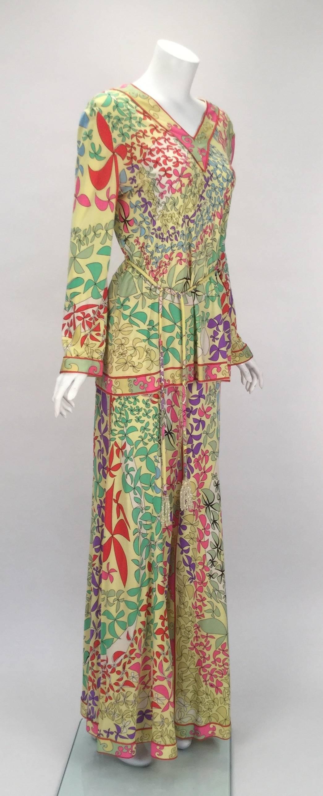 From Pucci to her own design room, Averardo Bessi designed this absolutely amazing 1970's vibrant multicolored, abstract floral print four piece ensemble. All pieces are printed with her designer's signature fabric, which is also signed with the