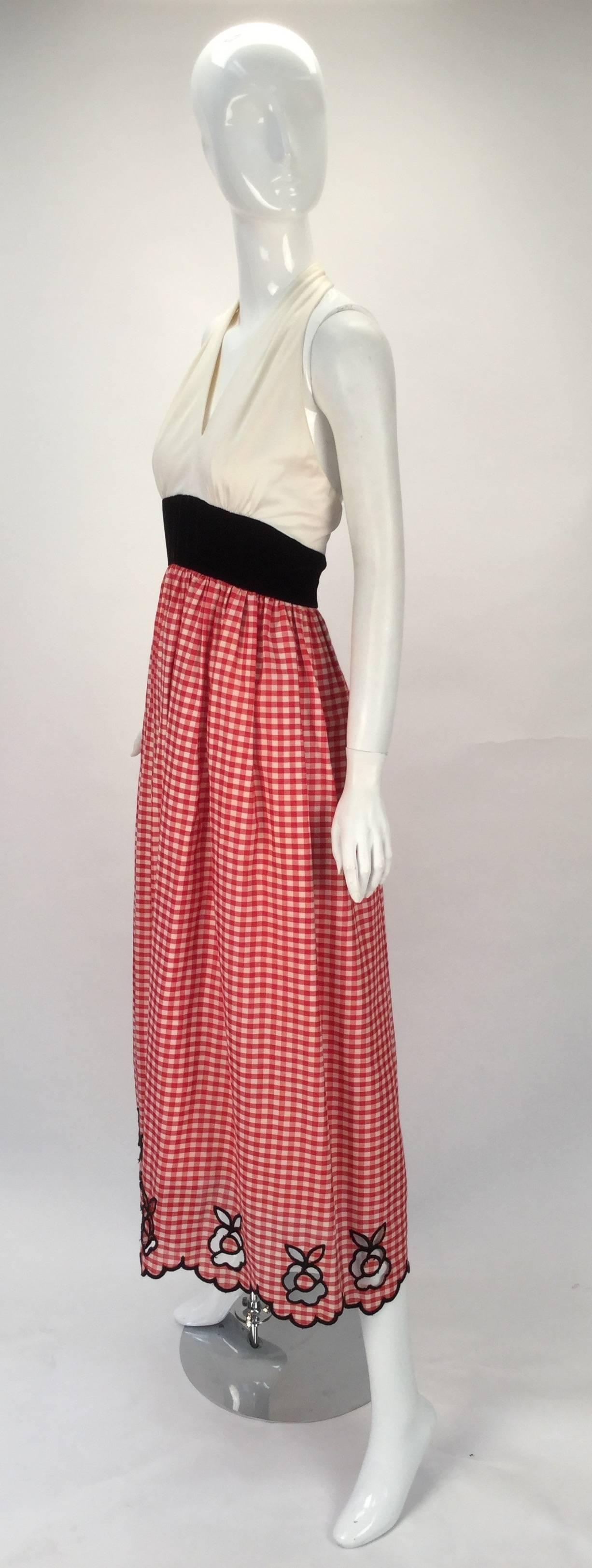 This is a great piece!  We think it must come from the episode where Gilligan's Marrianne forgot she wasn't Ginger -- little sexy with a little innocence added to the design.  

Custom made 1970's halter dress with red and white gingham print