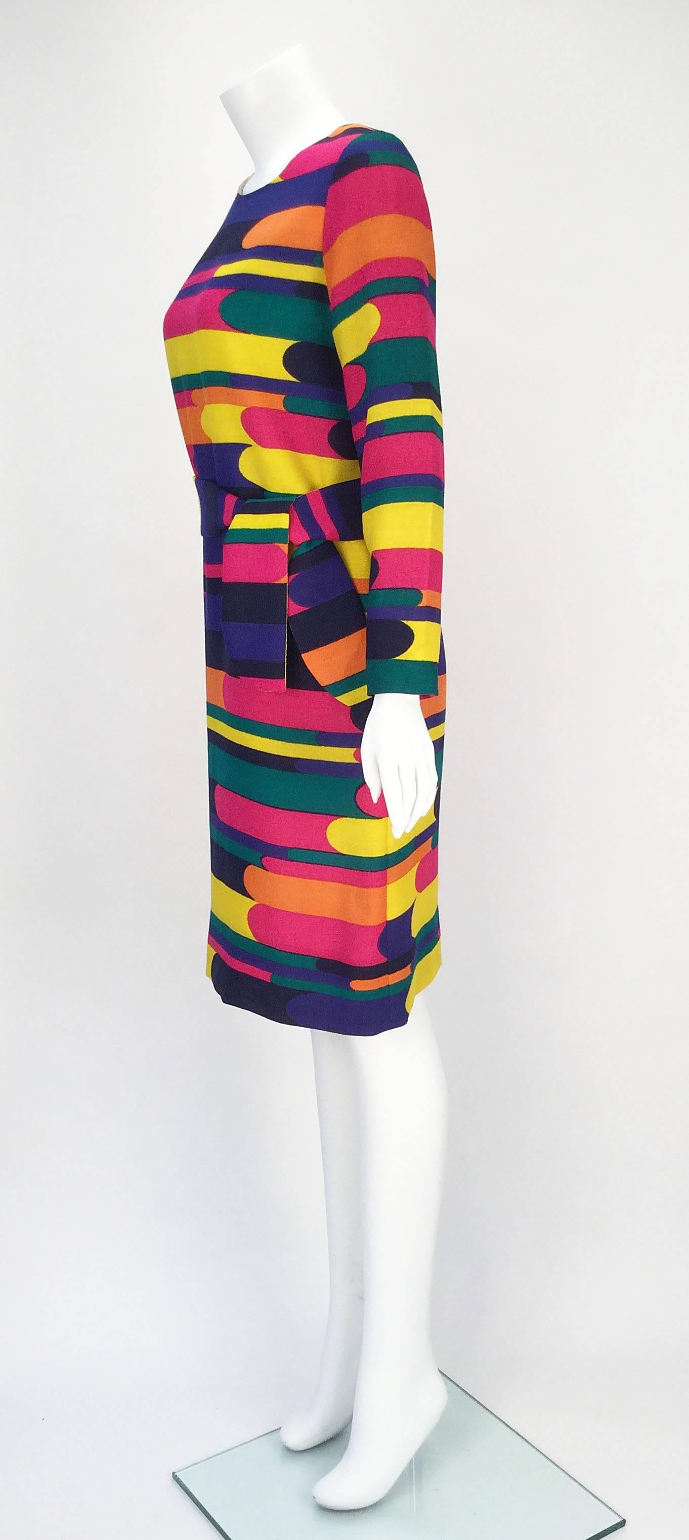 Fantastic late 60's/early 70's Bill Blass richly multicolored woven wool long sleeve dress.  We love this dress!!!!   Not often that we've seen Bill Blass looking soooooo mod! Boasts a scoop neckline. Fully lined. Center back zipper and hook and eye