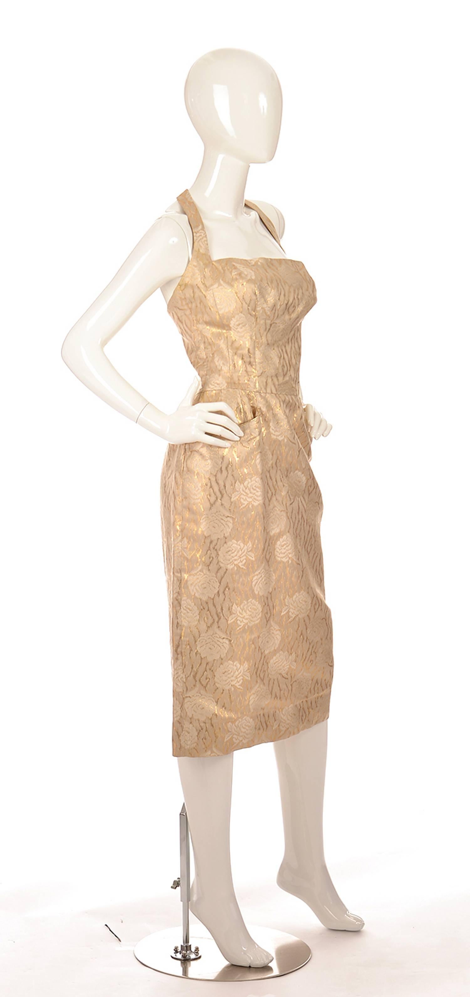 Fantastic and flattering Marilyn Monroe style gold rose floral racer back dress by Mignon. Ring in the holidays or dance the night away in the timeless bombshell beauty of a dress.  Mignon made this creation of fine gold floral fabric, and added a