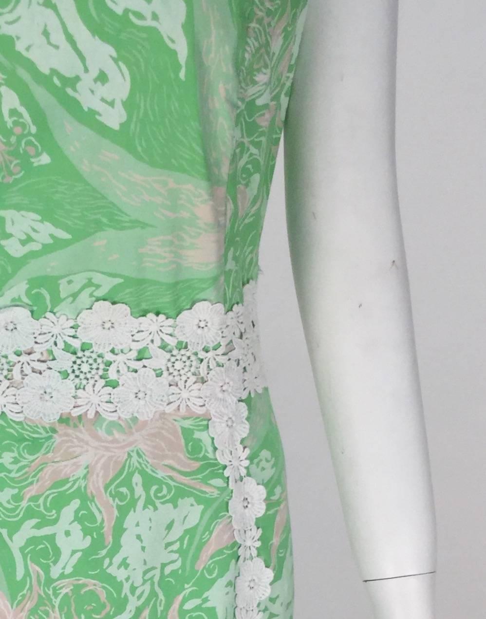 
Fantastic 1960's cotton green floral print with floral lace trim shift dress by Shifts Internationale of Miami. Not as well known as, Miami made Lilly Pulitzer designs of the same era, Shifts Internationale Designs were also from Miami, extremely
