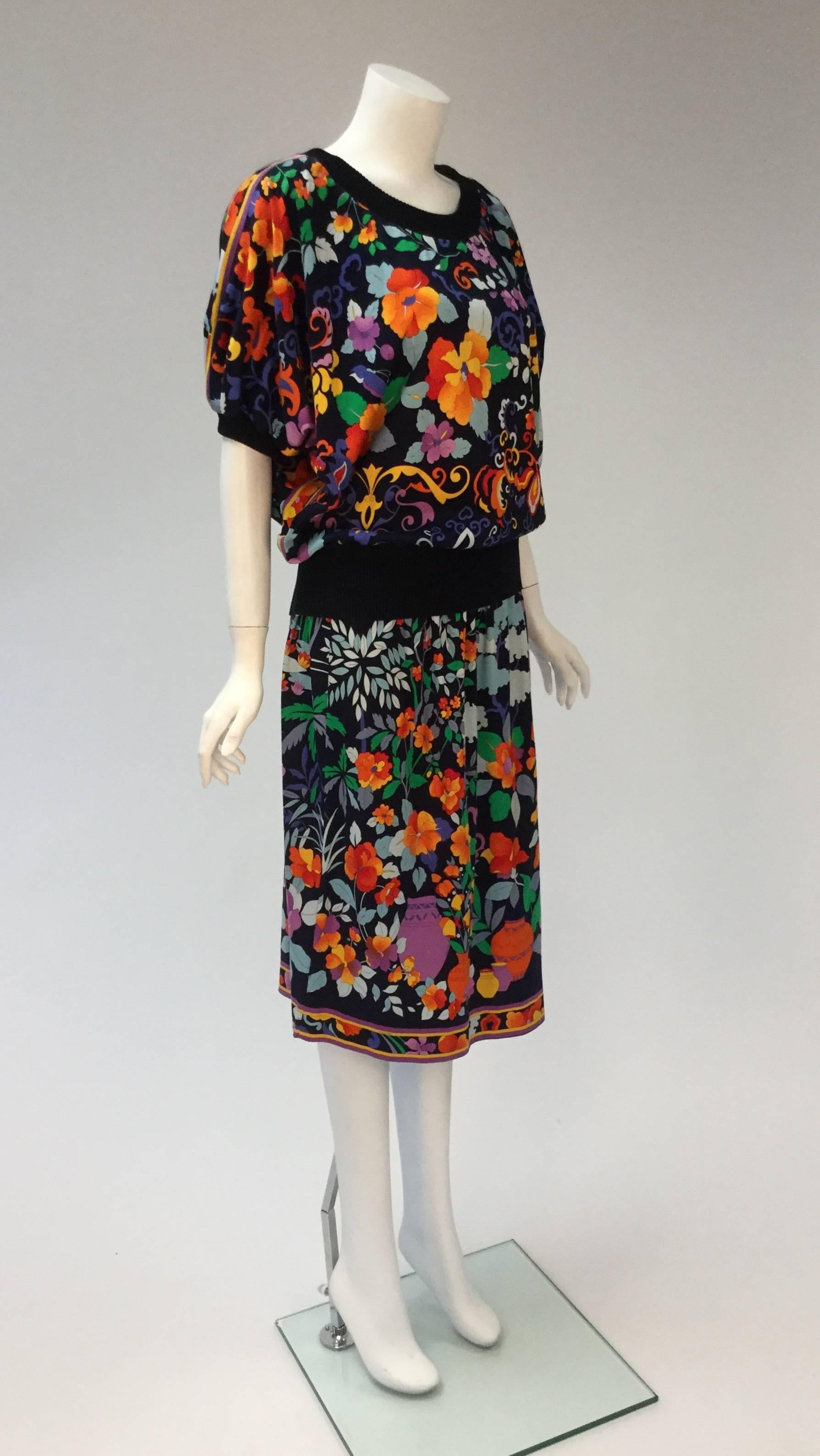 Fun and and uber comfortable ensemble from Leonard that can be worn year round. In addition, this one is easy to dress up or down and travels quite nicely.

The classic Leonard floral print is used both in the pima cotton skirt and its top. Neck,