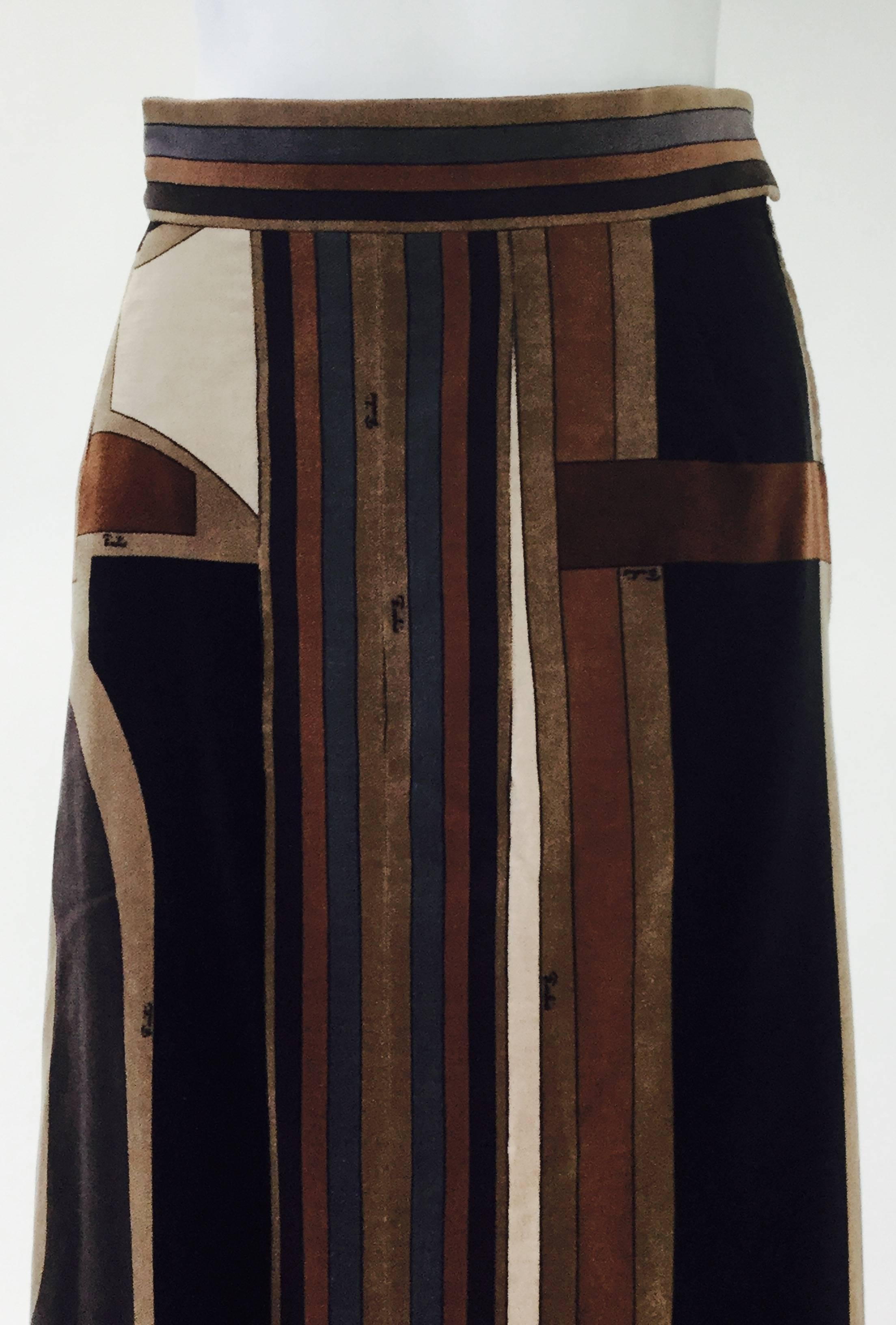 1970s velvet evening skirt by Emilio Pucci. This sumptuous velvet A-line ankle-length maxi evening skirt has an absolutely show-stopping print! The asymmetrical print features hard, straight lines coupled with elegant curves and angles, creating
