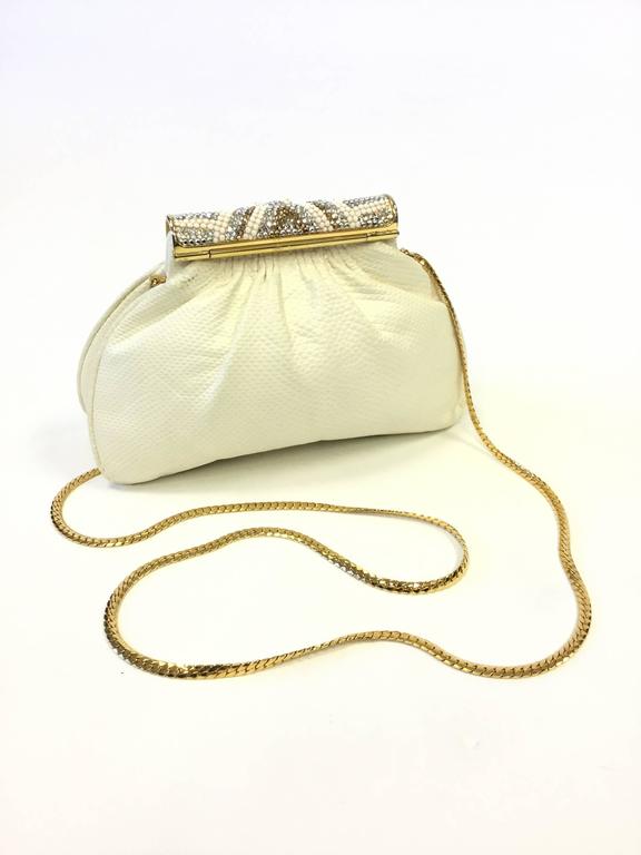 puma white and gold purse