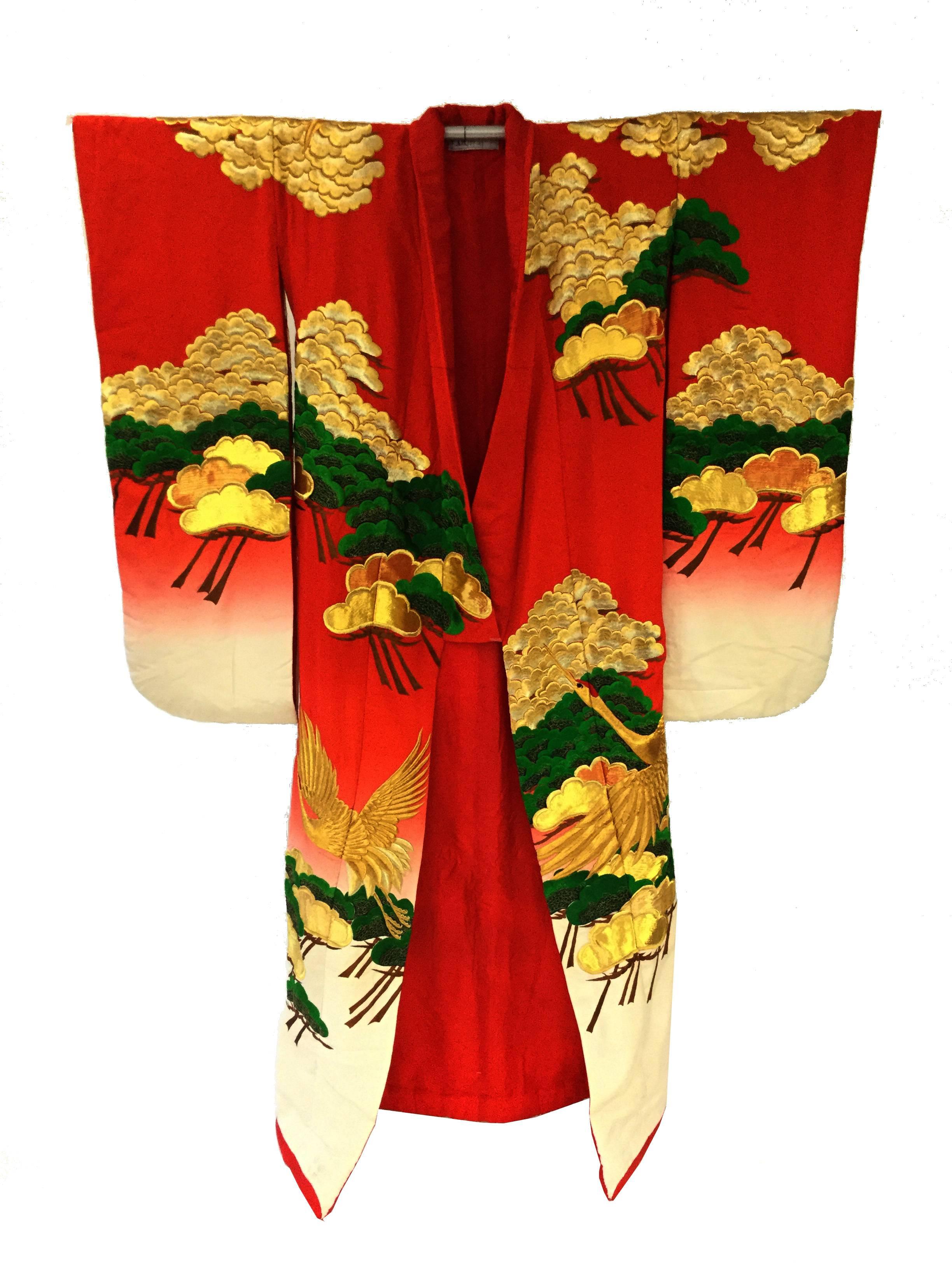 
Absolutely striking! The Uchikake kimono is a formal kimono coat work worn only by brides or by stage performers. We believe this particular piece to be a wedding kimono because of its color and motif. Traditionally, Japanese brides would wear