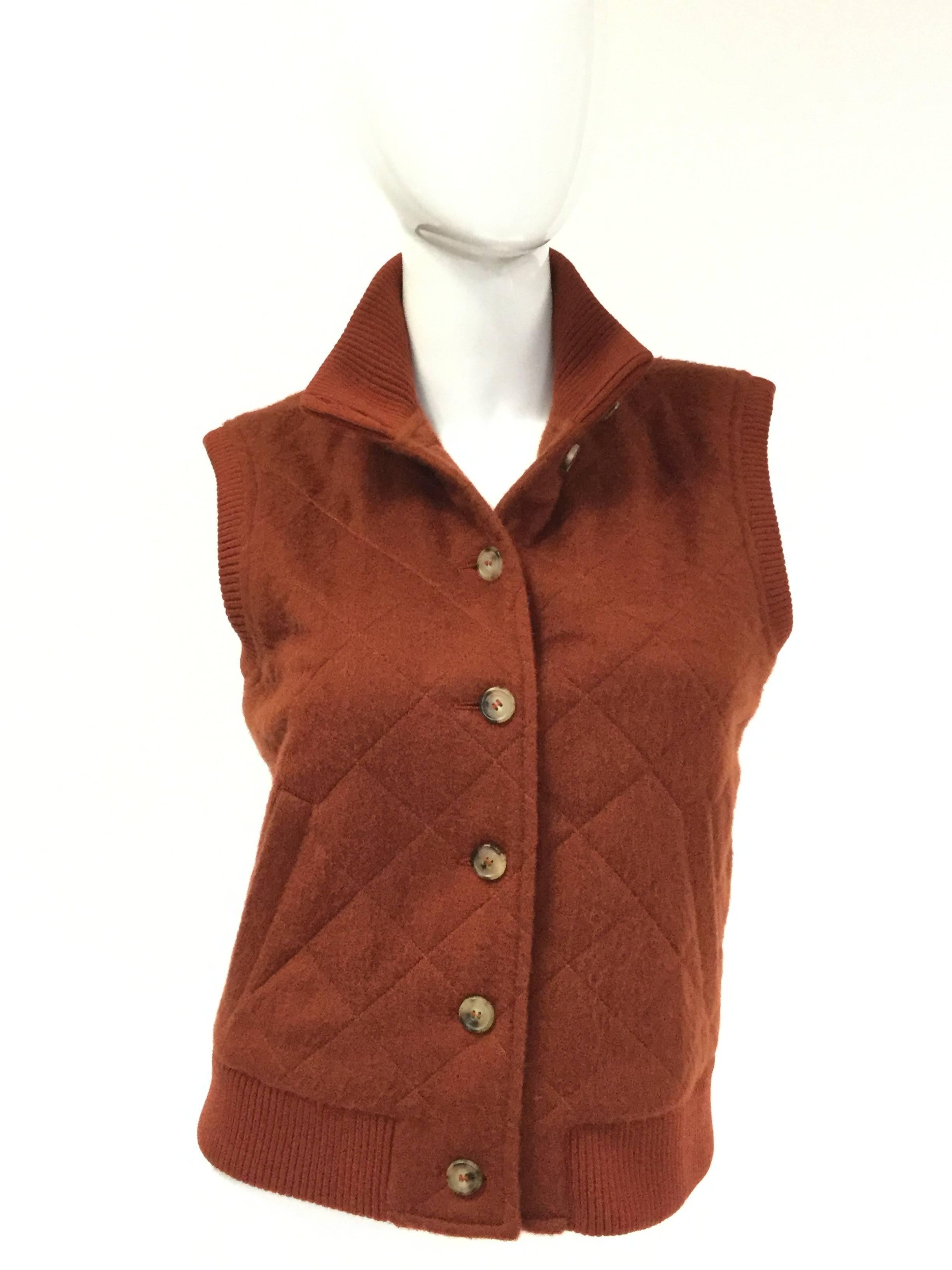 Plush and luxurious cashmere and ribbed trim Loro Piana vest!  This warm mahogany brown diamond quilted vest has a tall, flexible collar that can be work down for comfort or up for cold. The vest tapers at the waist and features tortoiseshell-look