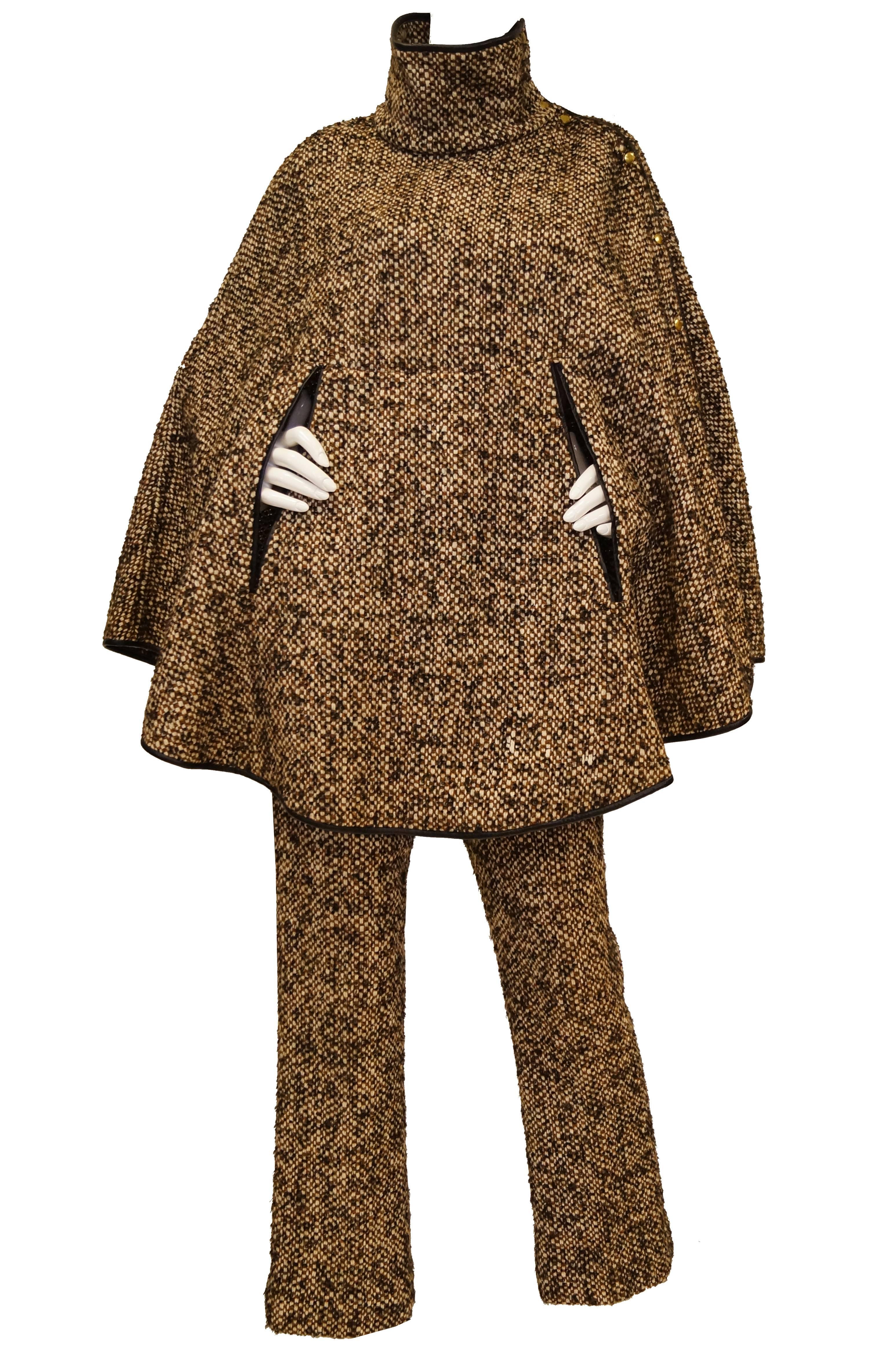 
Fantastic coordinating cape and trowser set by Bonnie Cashin for Sills and Company! The multi shades of brown cape, while often a dramatic and flamboyant garment, is made austere yet undeniably chic via the exaggeratedly large, relaxed barleycorn