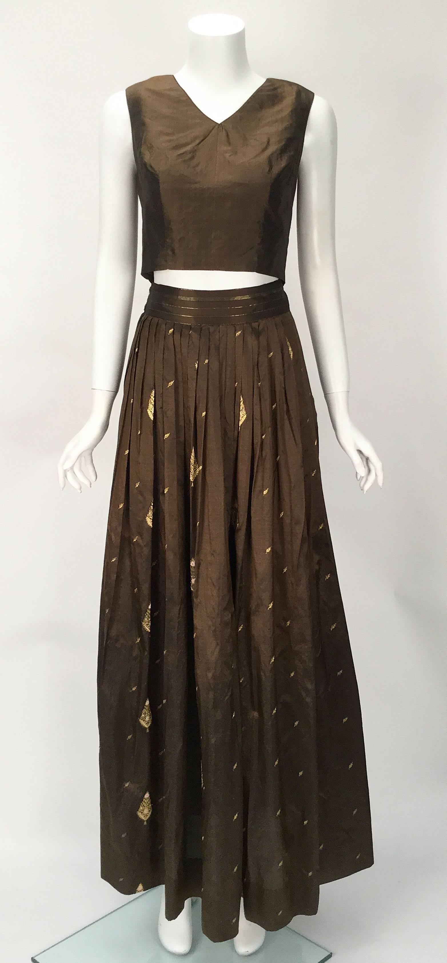 Spectacular three piece brown evening ensemble with metallic embroidery. Ethnic inspiration behind this beauty!  Amazingly versatile as you can wear it as an ensemble or wear each piece individually paired with staple pieces you own. Dress it down