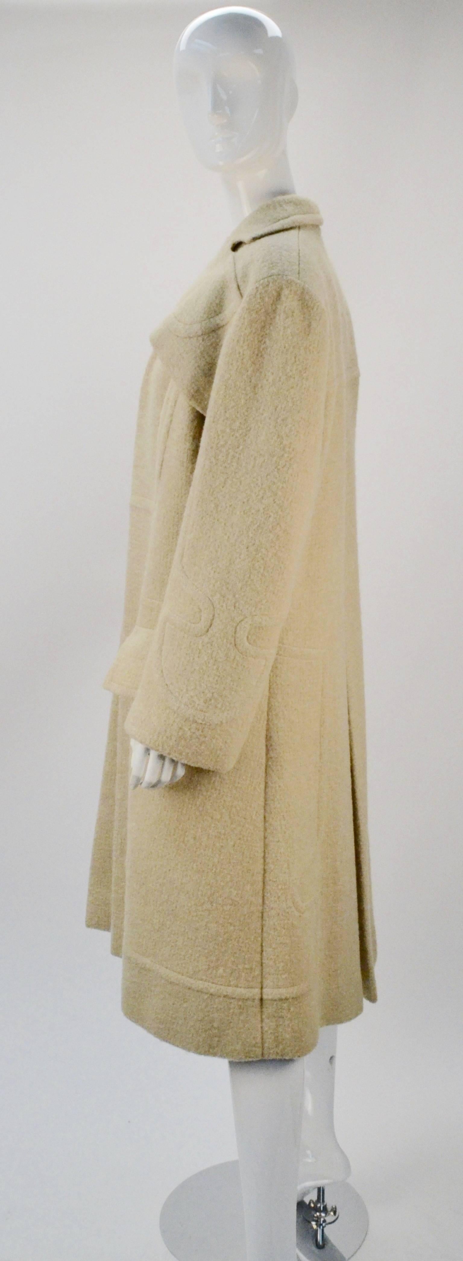 Drop dead GORGEOUS Gilbert Adrian coat from the 1940's. As new today as when he designed and created it.  Adrian, the designer to stage, screen, and the stars when off camera, is one of America's most coveted and collectible fashion designers.  It