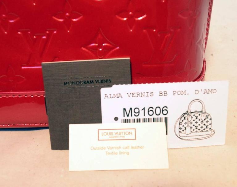 AUTHENTIC LOUIS VUITTON MONOGRAM VERNIS ALMA BB BAG M91606 RED