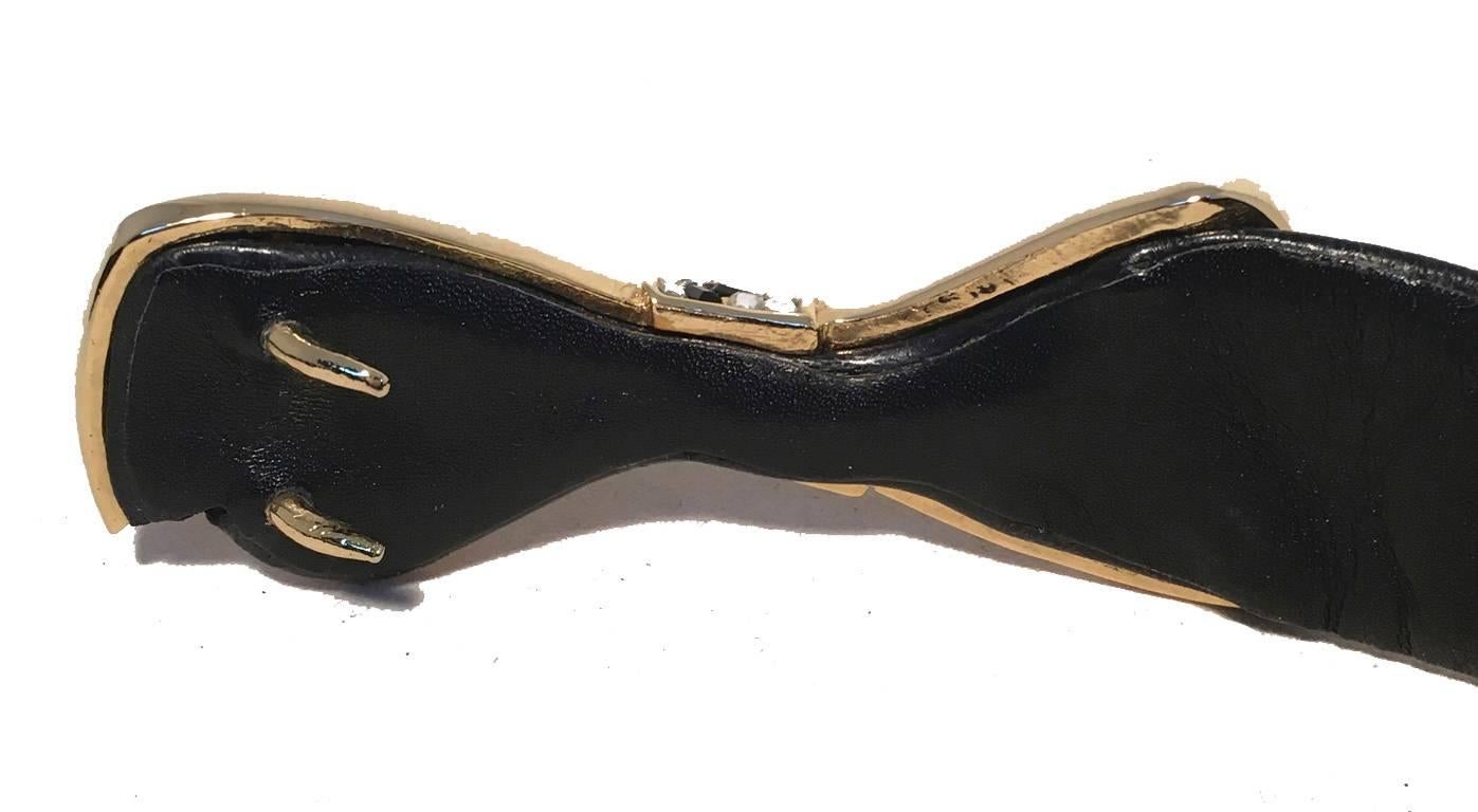 GORGEOUS Vintage Judith Leiber crystal bow belt in excellent condition.  Black leather belt that can be adjusted for various waist sizes. Crystal Bow front buckle closure with clear and black crystals and gold hardware.  No scuffs, scratches or