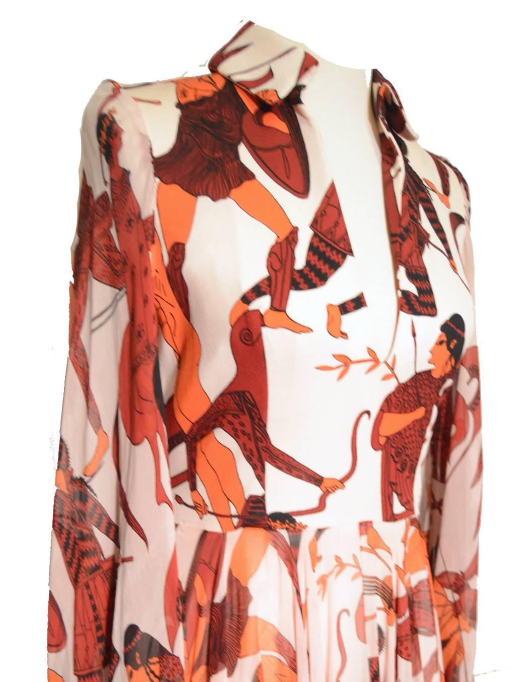Vintage print silk dress by La Mendola for Nan Duskin c1970s.  Fabulous grecian print design throughout featuring ancient Greek or Roman hunters/warriors and horses in deep red, orange and black over a white background.  Polyester bodice with wide