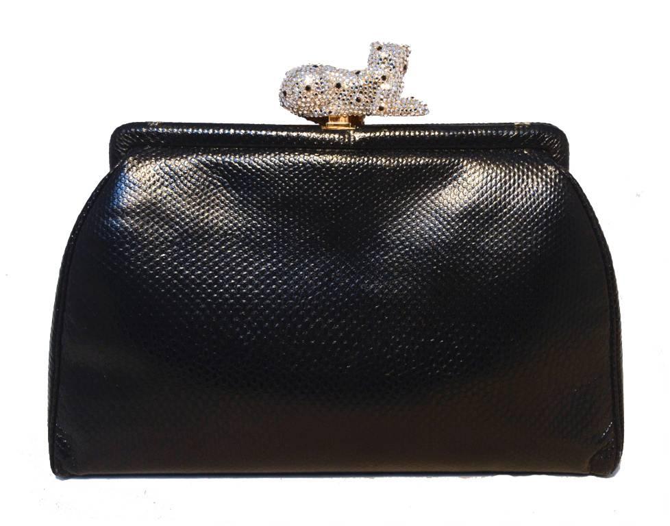 Stunning Judith Leiber black lizard clutch in excellent condition.  Black lizard leather body with gorgeous Swarovski crystal spotted leopard top closure. Black satin lined interior that holds 1 side slit and 1 side zippered pockets and attached