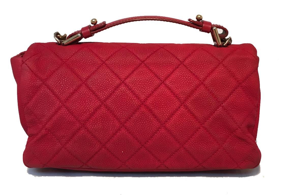 Beautiful Chanel red nubuck leather coco handle classic flap in excellent condition.  Red nubuck caviar leather exterior trimmed with bronze hardware.  Top handle and attached shoulder strap easily convert this piece between handbag and shoulder bag