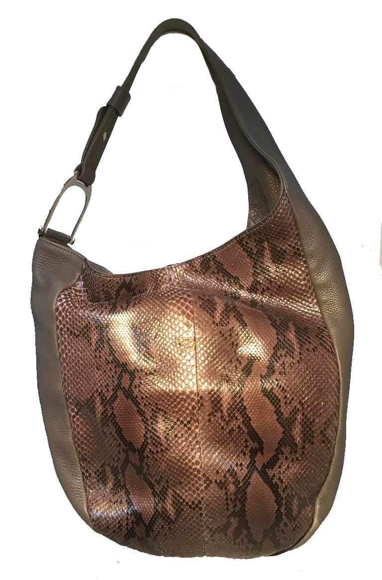 RARE GUCCI leather and snakeskin hobo bag in very good condition.  Soft Grey lambskin with making snakeskin leather exterior trimmed with silver hardware.  Top zipper closure opens to a beige woven linen lined interior that holds ample storage space