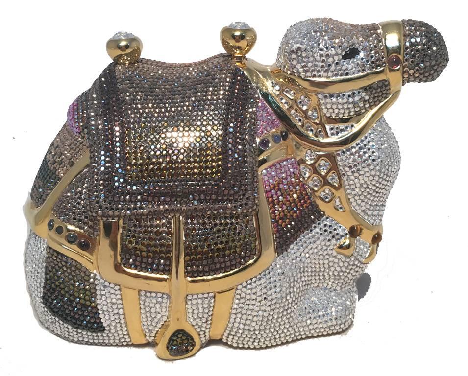 STUNNING Judith Leiber Swarovski Crystal Camel minaudere in excellent condition.  Multi color Swarovski crystal exterior in a beautiful crouching camel shape complete with saddle and riding harness.  Top button closure opens to a gold leather lined