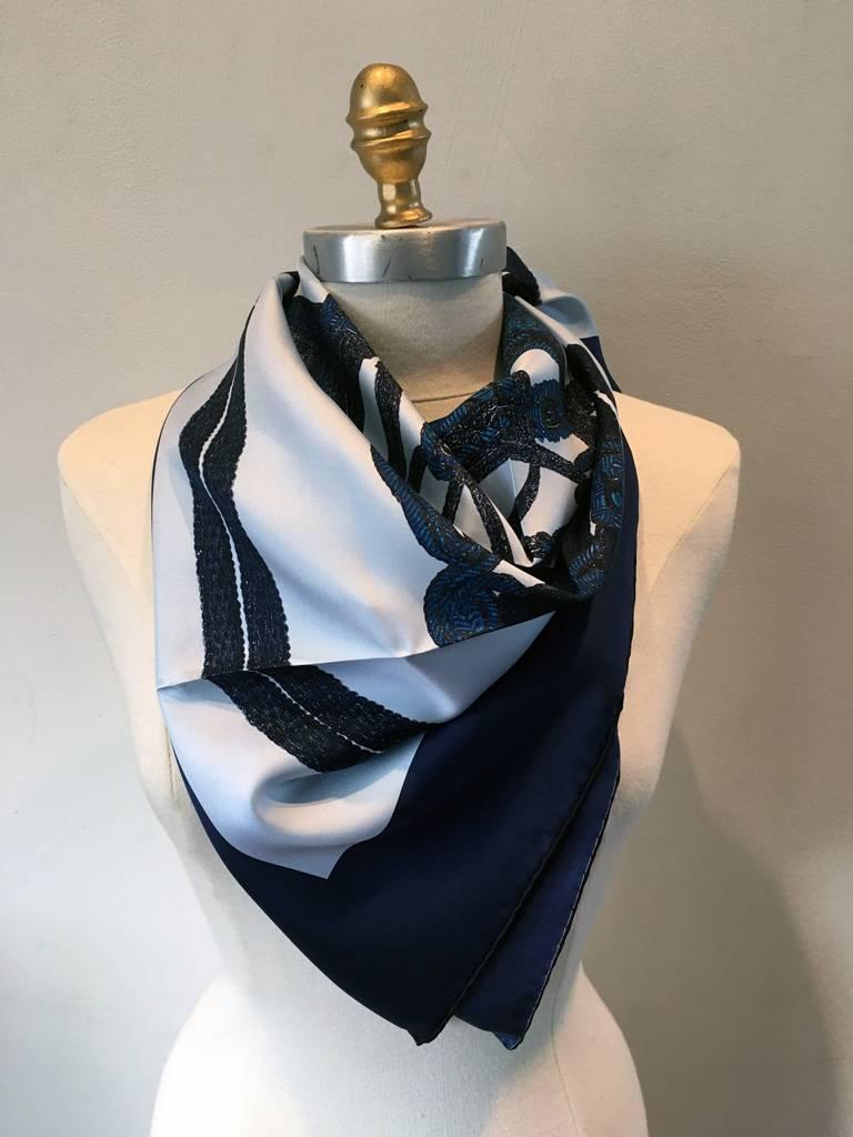 CLASSIC Hermes blue Brides de Gala silk scarf in NWOT conditon.  Original silk screen design c1950s by Hugo Grygkar features a dark blue border, baby blue background with dark bridal horse dressings centered in scarf.  This is a classic Hermes scarf