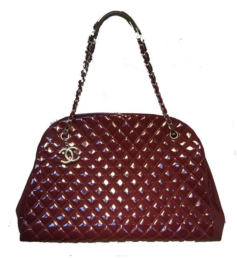 GORGEOUS Chanel maroon patent leather shoulder bag tote in excellent condition.  Beautiful quilted maroon patent leather trimmed with shining silver hardware and signature woven chain and leather shoulder straps.  Top snap closure opens to a