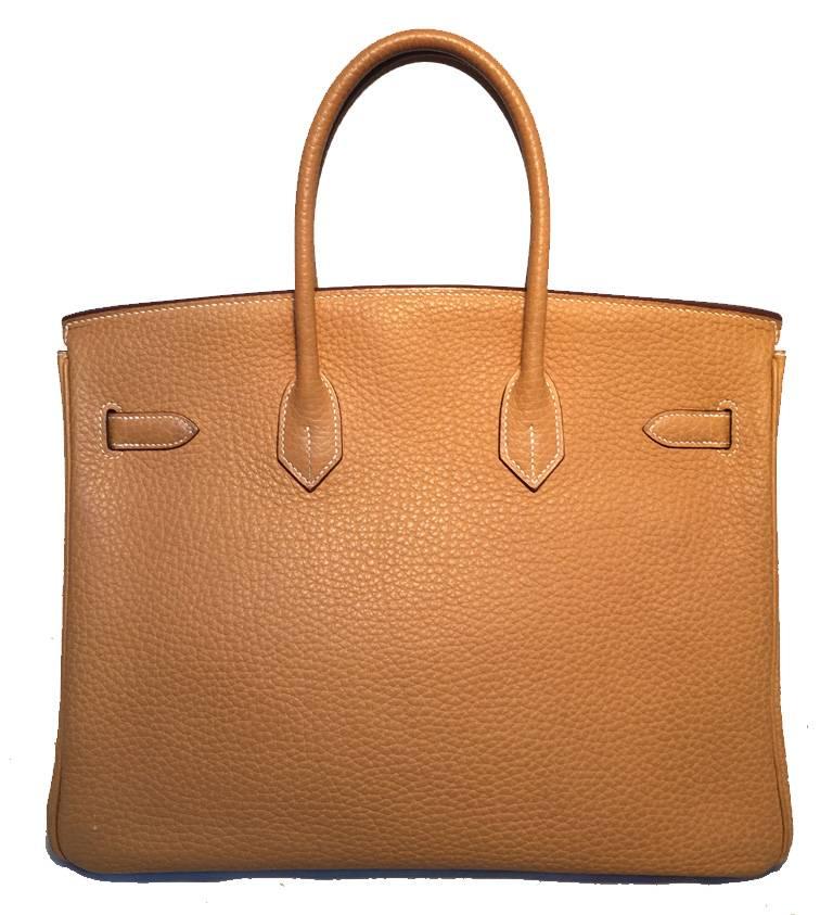 GORGEOUS Hermes 35cm natural sable Birkin bag in very good condition.  Natural sable vachette fjord leather exterior trimmed with gold hardware.  Signature front twist closure opens to a matching tan leather lined interior that holds 2 slit and 1