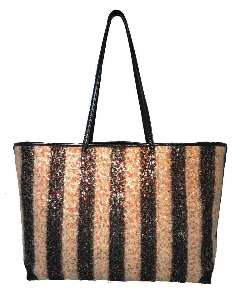 Gorgeous Fendi striped sequin wool shopper tote in excellent condition.  Black and tan striped wool exterior woven with delicate sequins throughout to add a touch of glamour.  Black patent leather trim and handles. Brown nylon interior with 1 side