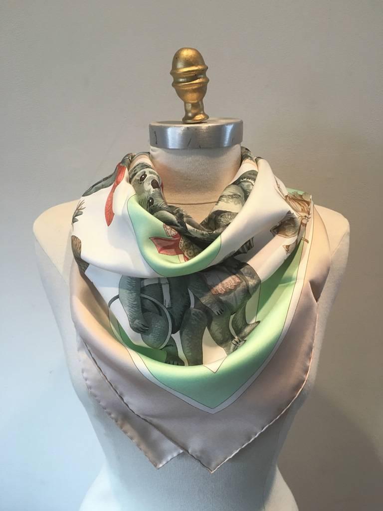 ADORABLE Hermes Confidents des Coeurs silk scarf in excellent condition.  Original silk screen design c2000 by Loïc Dubigeon features a beautiful design of teddy bears surrounded by a mint green and beige border with a ivory background. Various