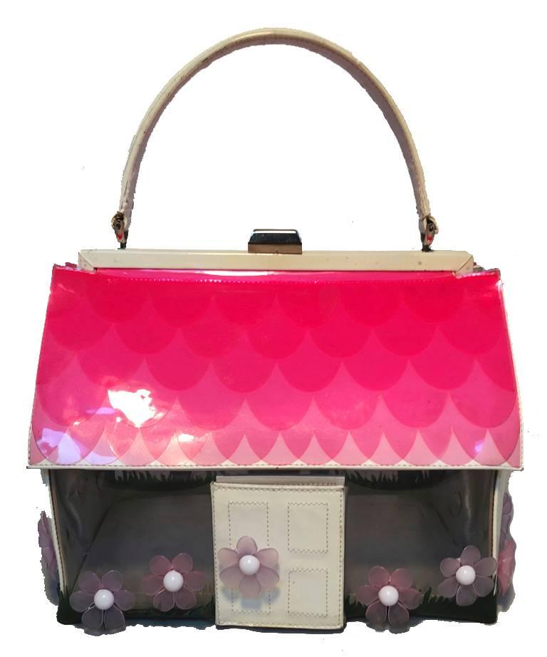 RARE & AMAZING Vintage Moschino House handbag in very good vintage condition.  White patent leather house with Clear walls and pink and purple flowers around base.  Pink scalloped roof, and silver hardware trim.  Door opens to reveal a mirror.  Top