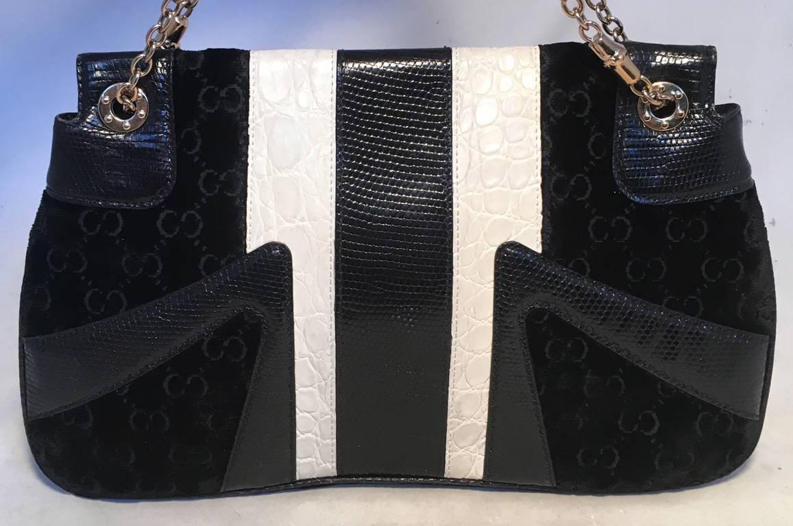 GORGEOUS GUCCI by Tom Ford jeweled dragon shoulder bag in excellent condition.  Black embossed velvet with white alligator and black lizard exterior trimmed with gold hardware and a jeweled front dragon design emblem along the top flap.  Snap